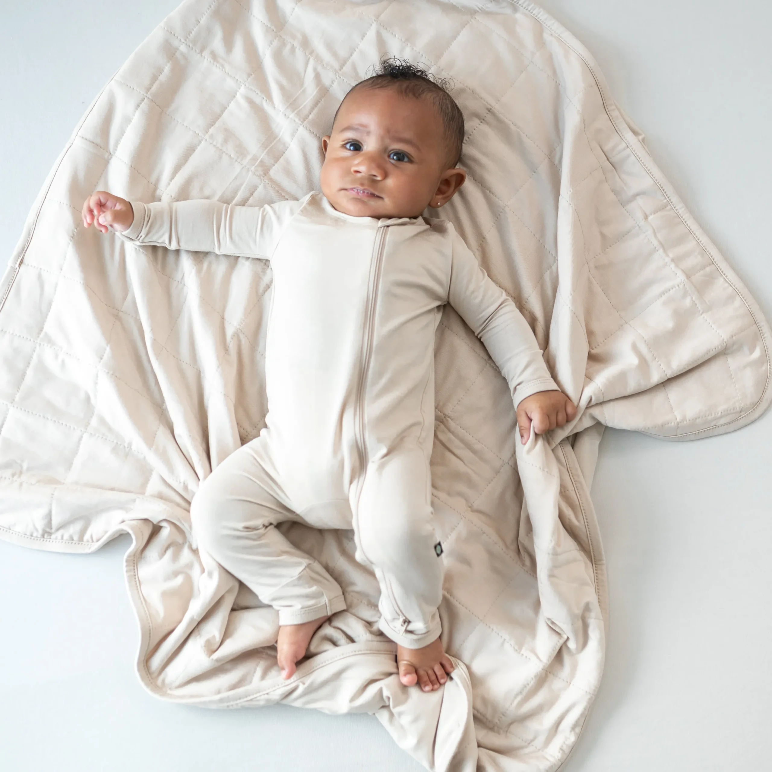 Kyte Baby Baby Blanket in 1.0 Bisque Hot
