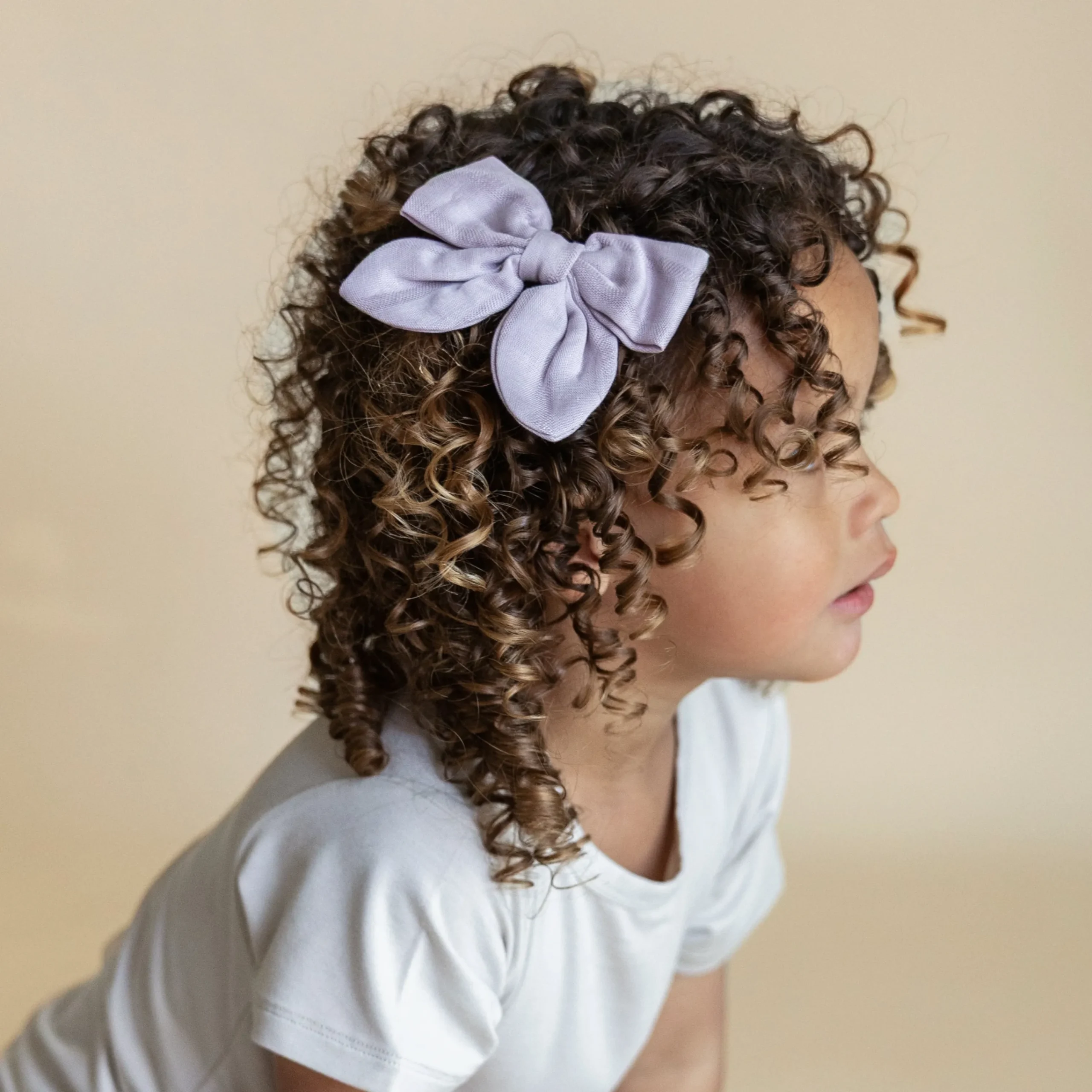 Kyte Baby Bamboo Muslin Alligator Clip Bow in Wisteria Sale