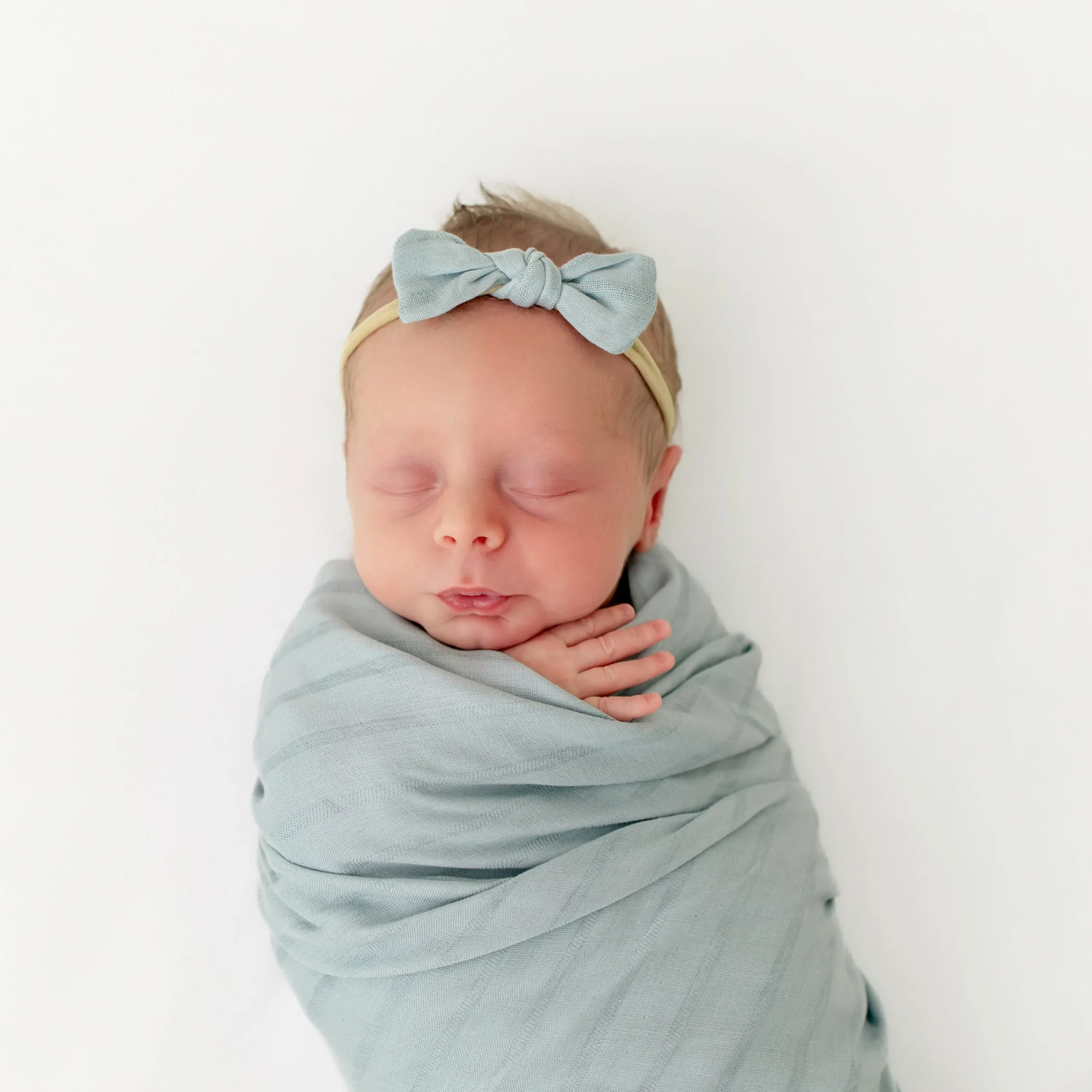 Kyte Baby Bamboo Muslin Swaddle Blanket in Mist Hot