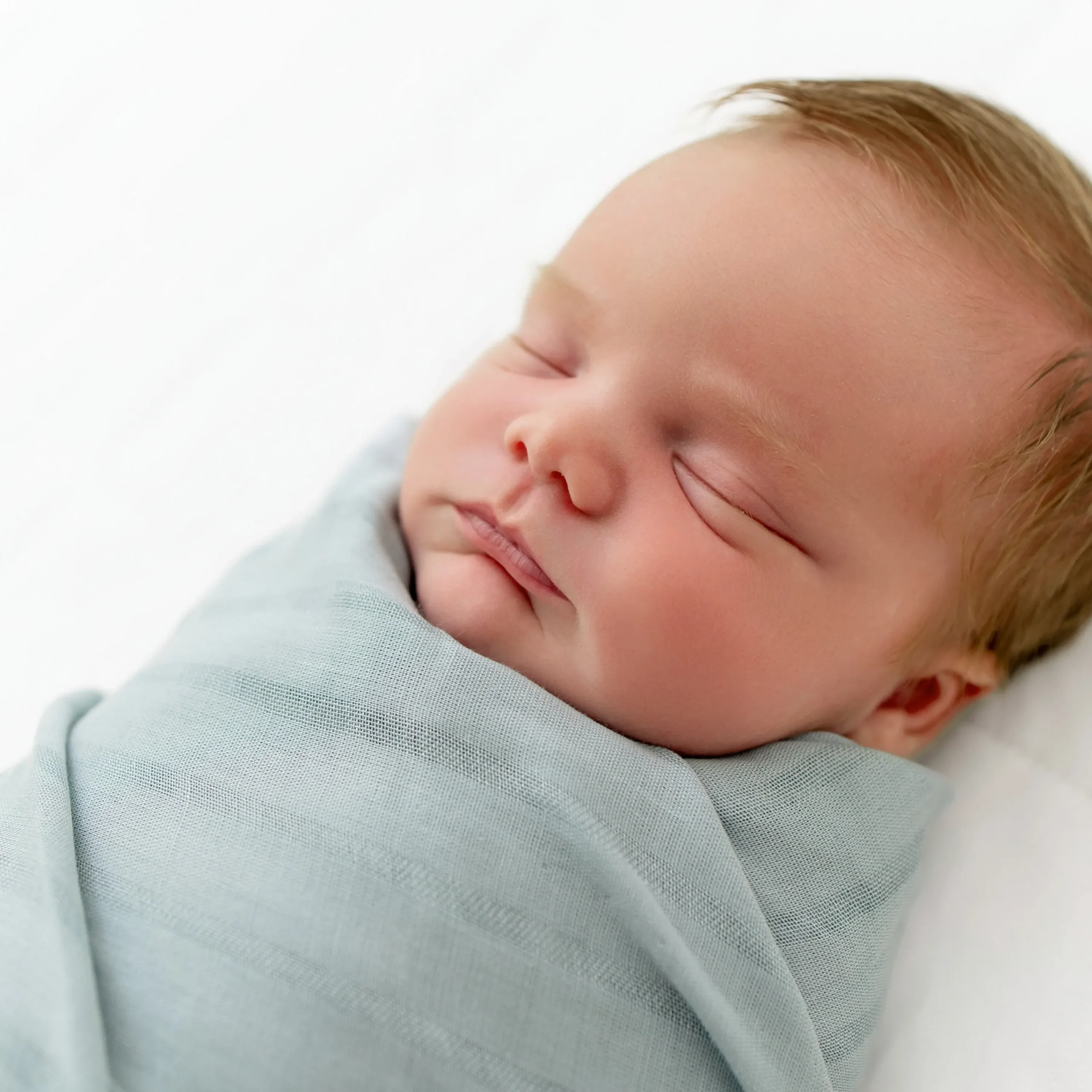 Kyte Baby Bamboo Muslin Swaddle Blanket in Mist Hot