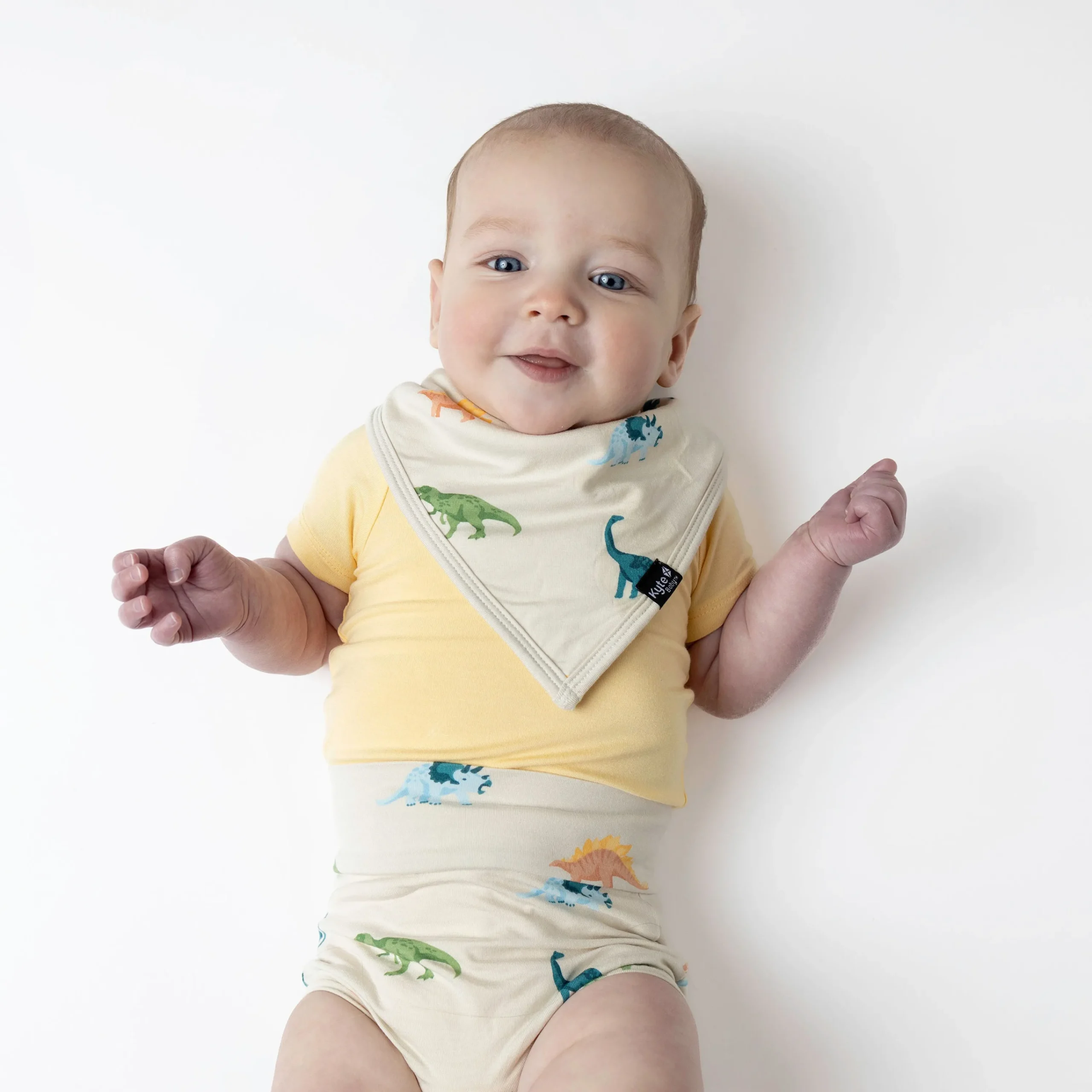 Kyte Baby Bib in Ecru Roar Sale