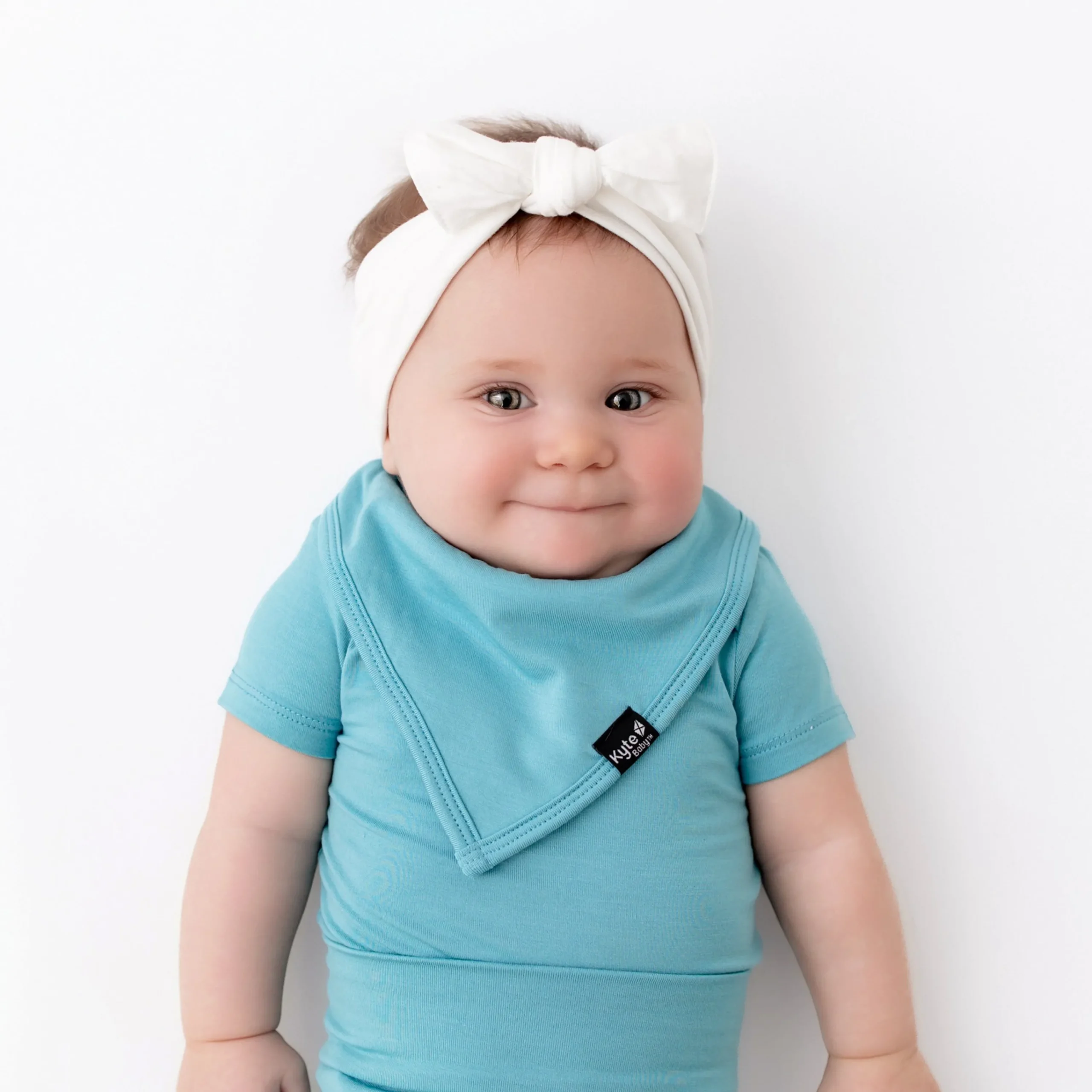 Kyte Baby Bib in Makai Sale