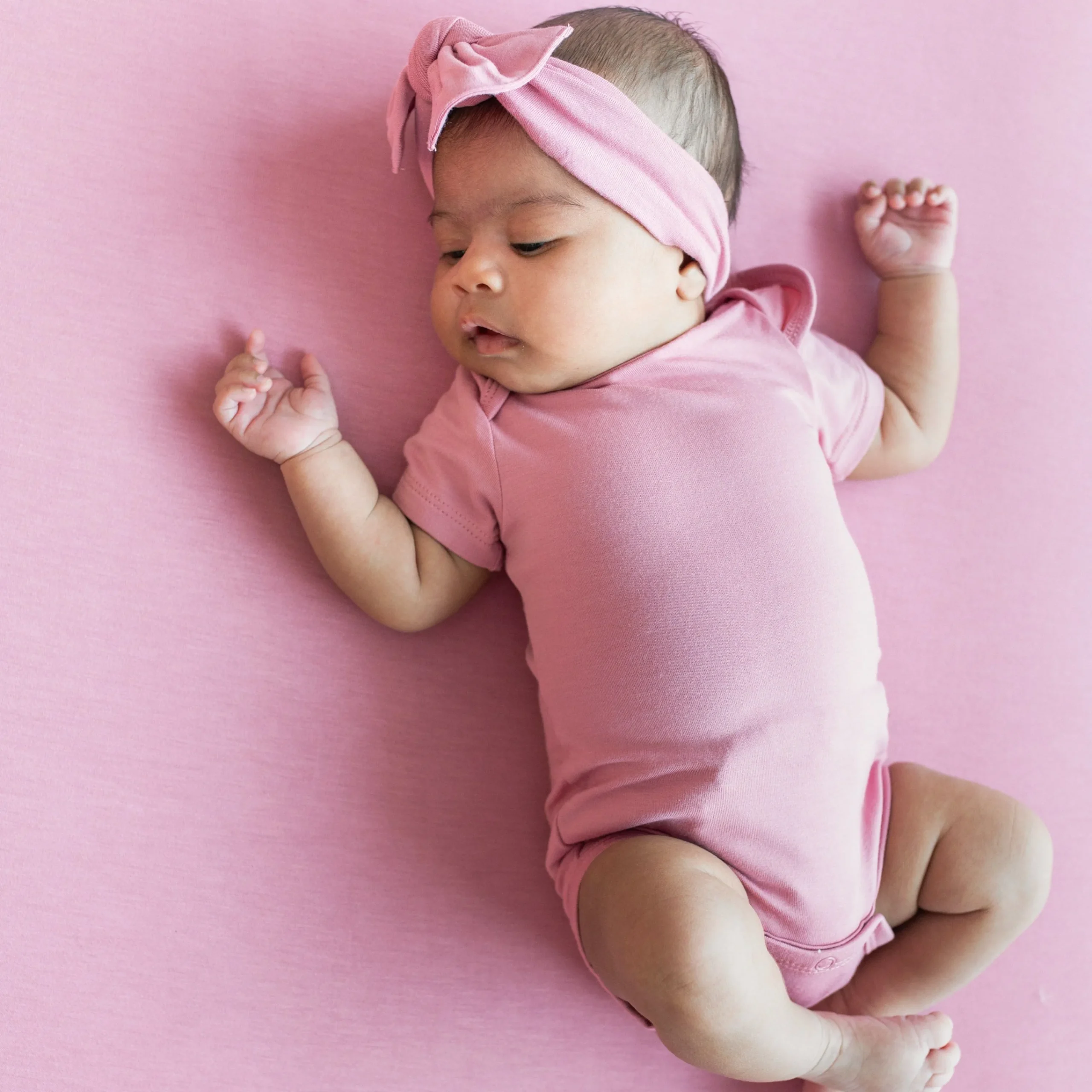 Kyte Baby Bodysuit in Apple Blossom Best
