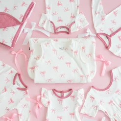 Kyte Baby Bodysuit in Bow Hot