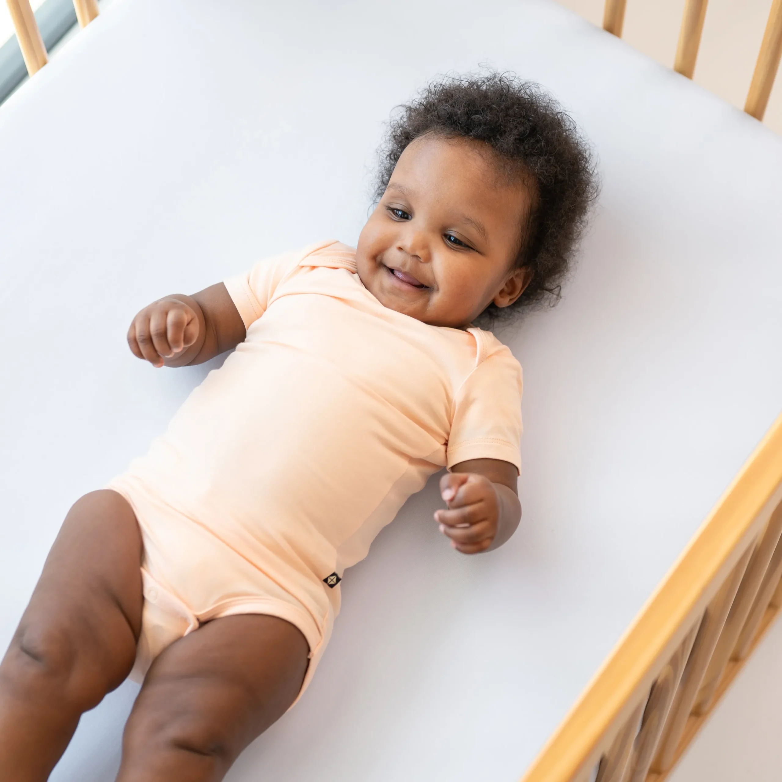 Kyte Baby Bodysuit in Canyon Sale