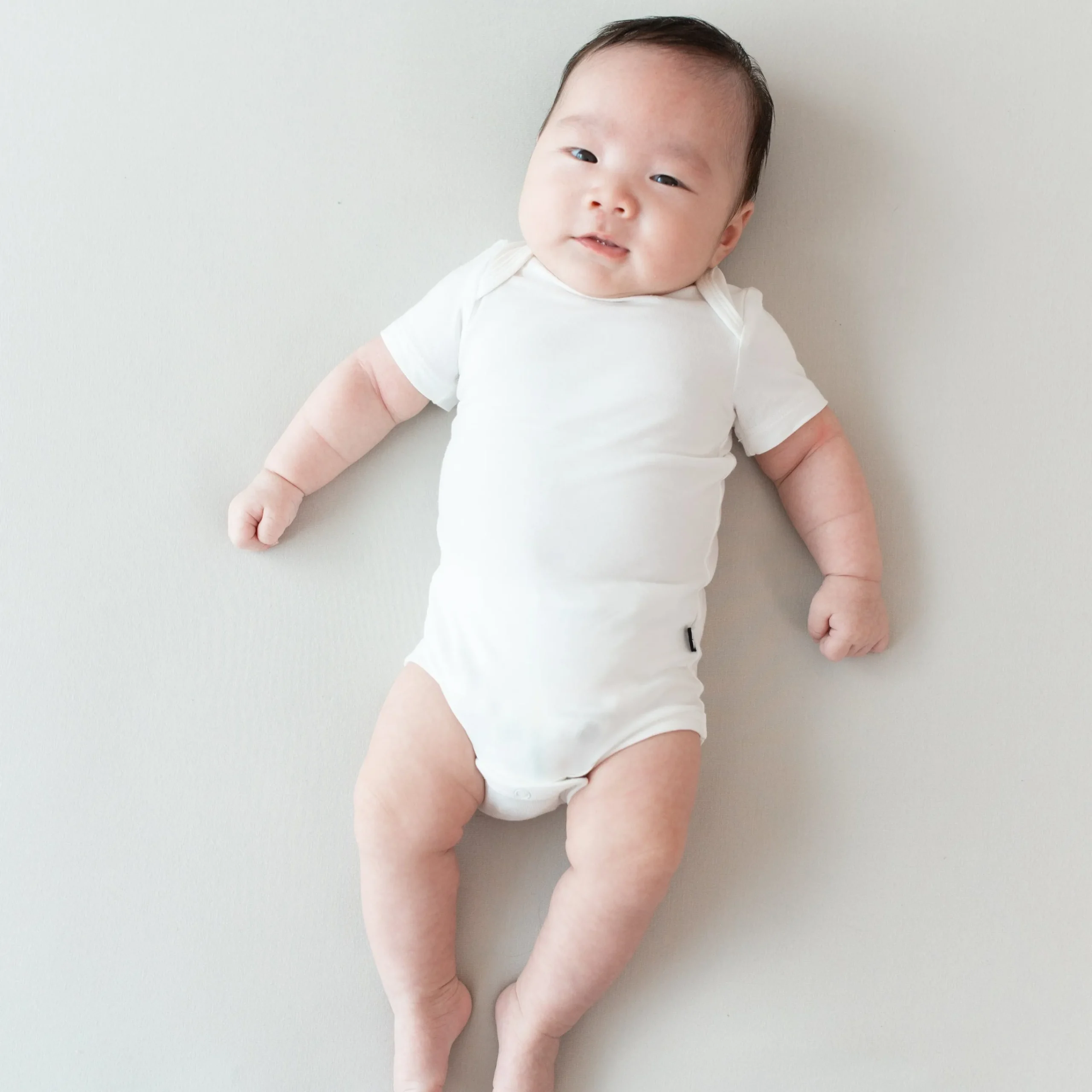Kyte Baby Bodysuit in Cloud Discount