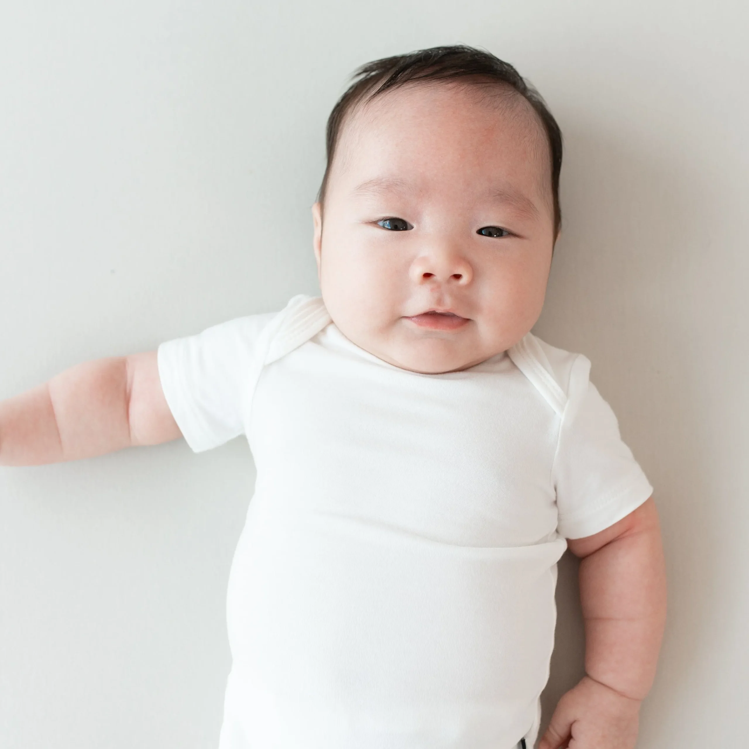 Kyte Baby Bodysuit in Cloud Discount
