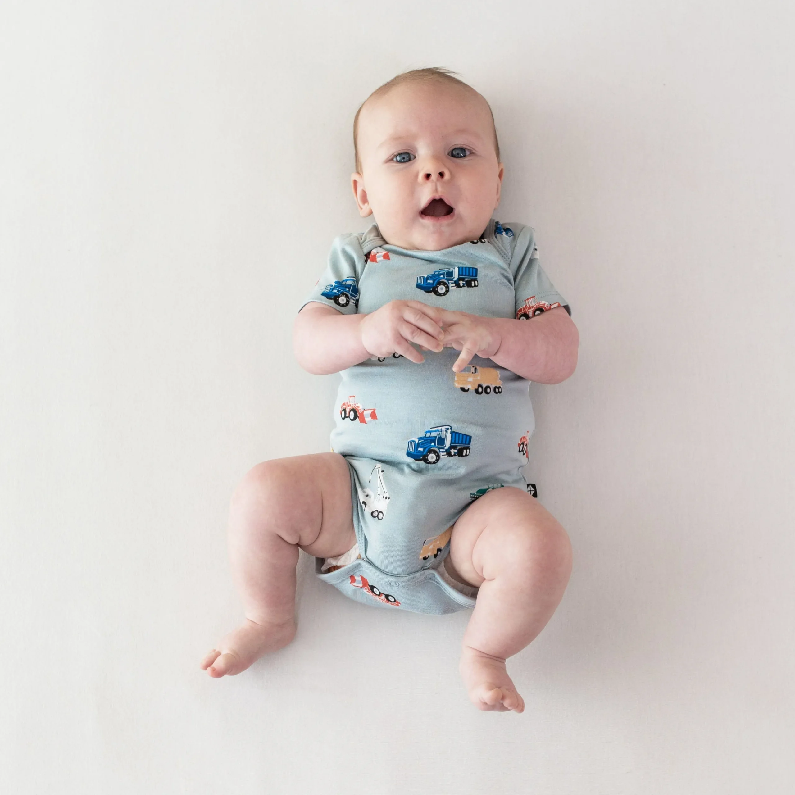 Kyte Baby Bodysuit in Construction Online