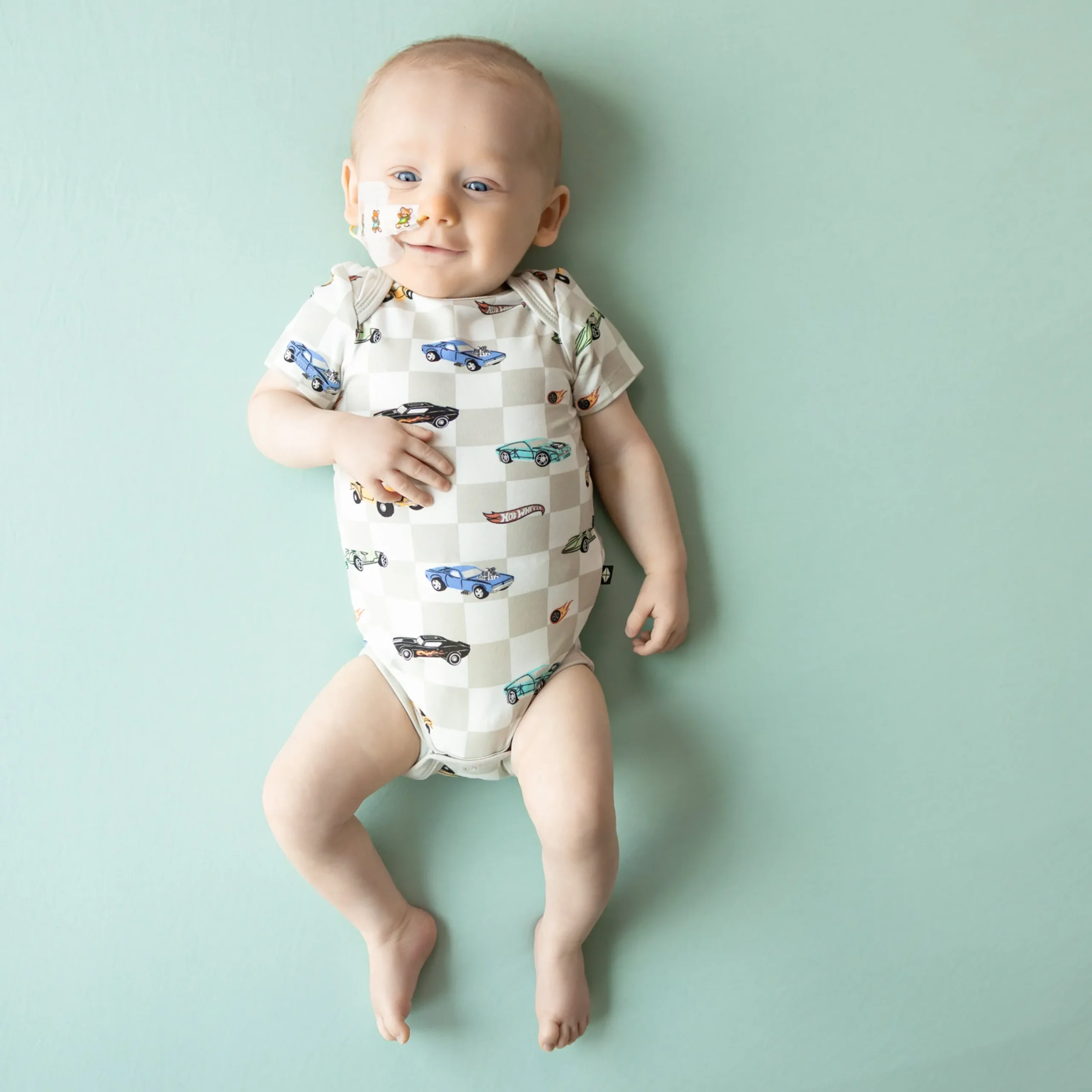 Kyte Baby Bodysuit in Fast and Fierce Outlet