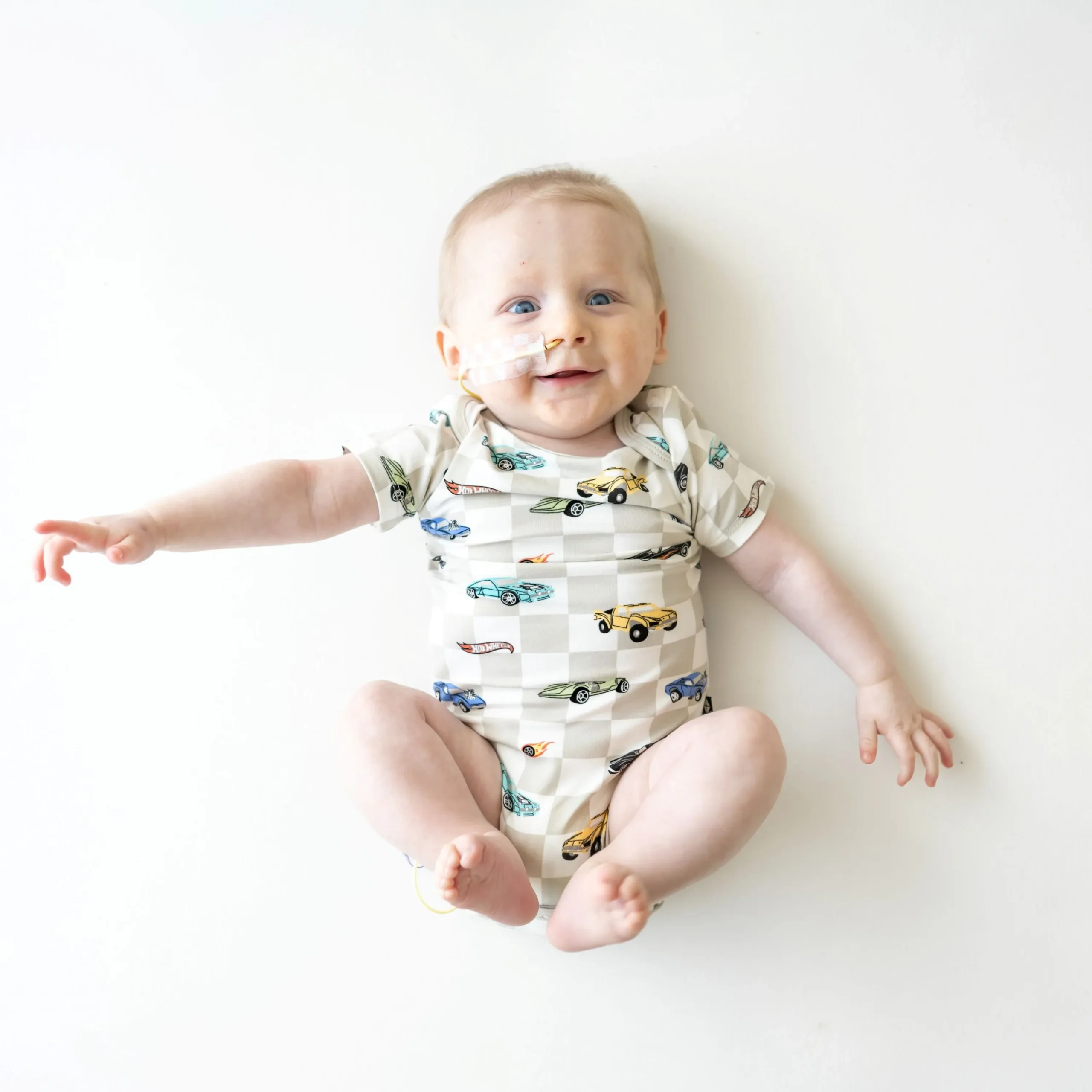 Kyte Baby Bodysuit in Fast and Fierce Outlet