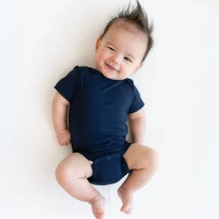 Kyte Baby Bodysuit in Navy Hot