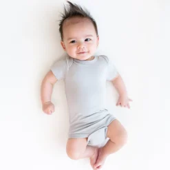 Kyte Baby Bodysuit in Storm Hot
