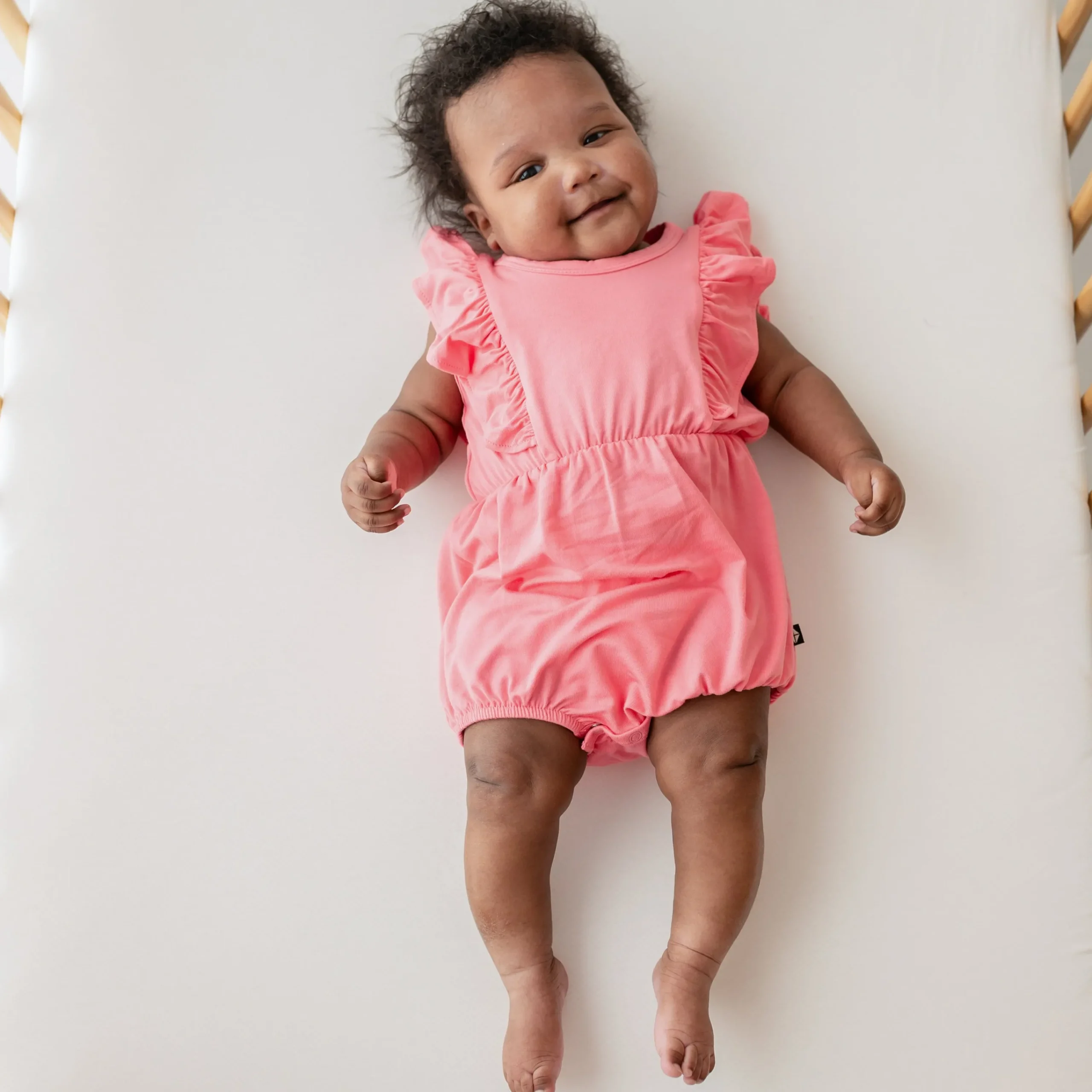 Kyte Baby Bubble Romper in Guava Best