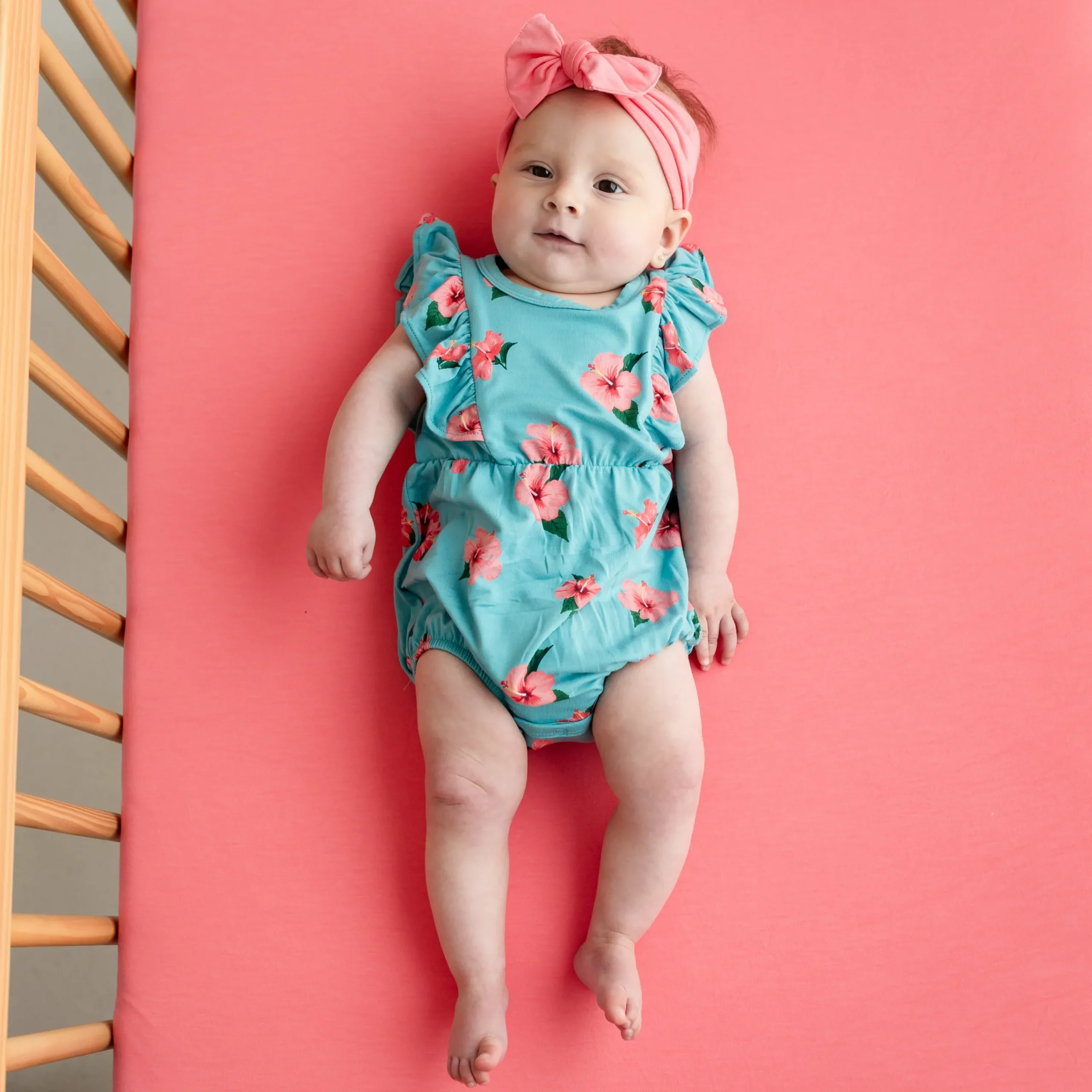 Kyte Baby Bubble Romper in Hibiscus Discount