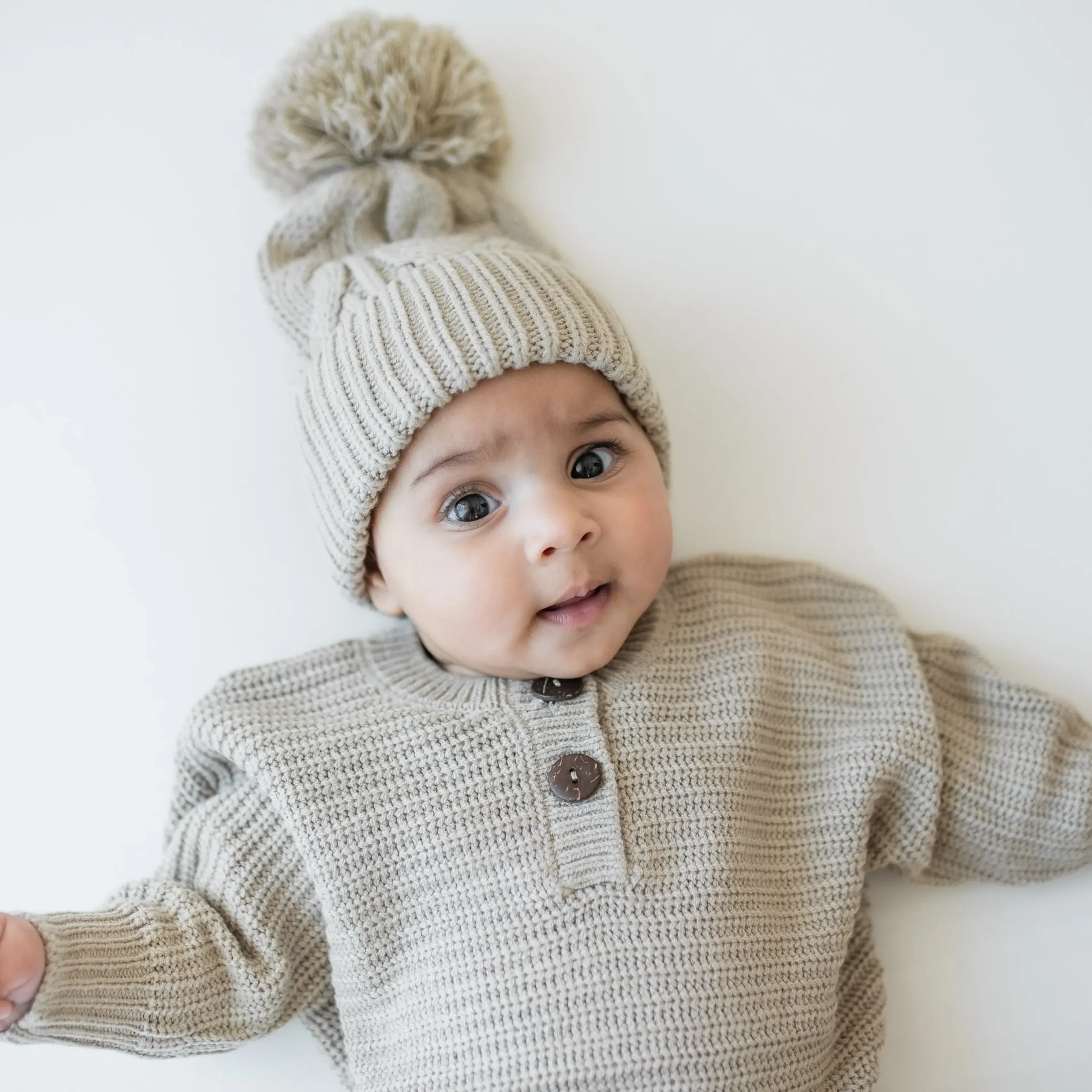 Kyte Baby Chunky Cable Knit Beanie in Almond Hot