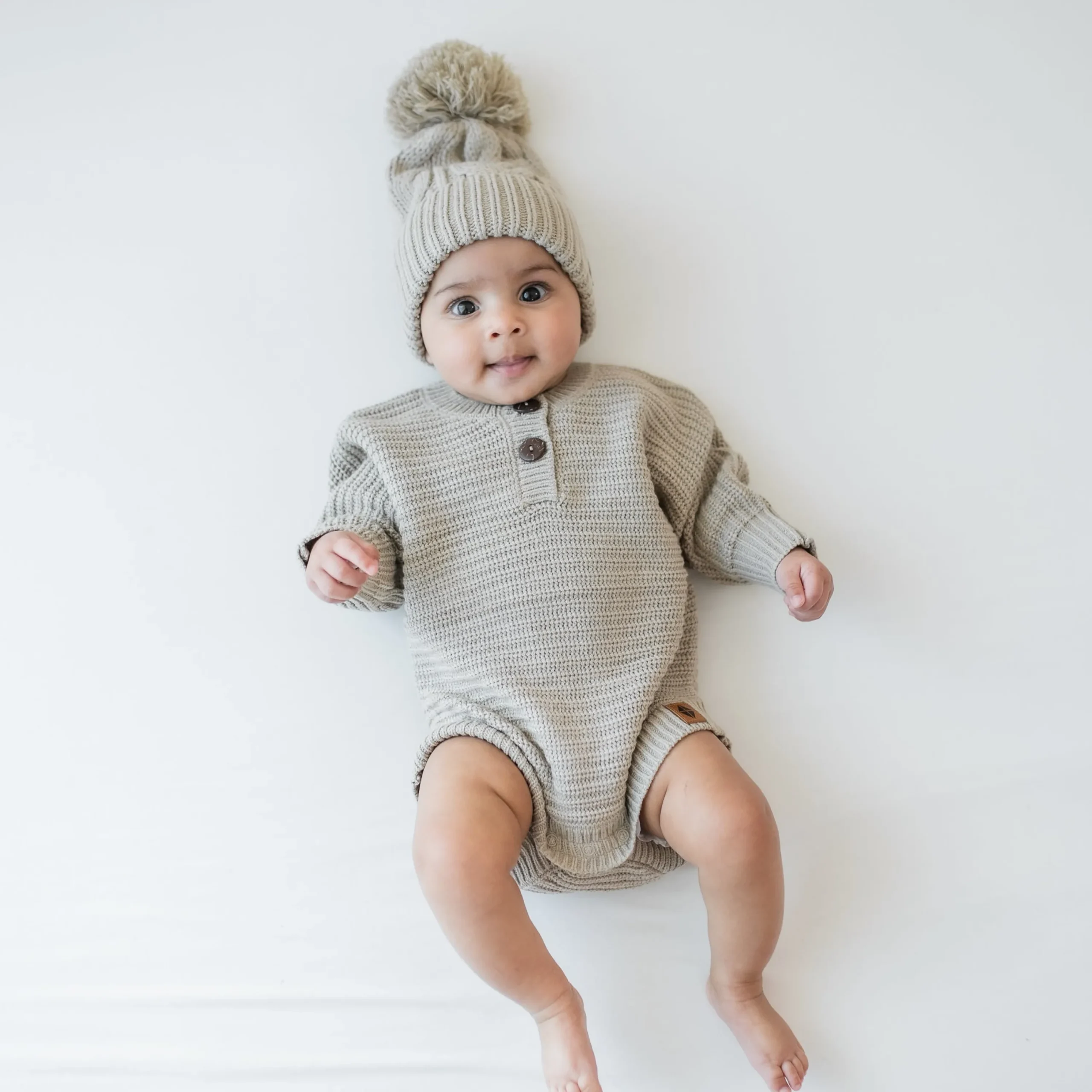 Kyte Baby Chunky Cable Knit Beanie in Almond Hot