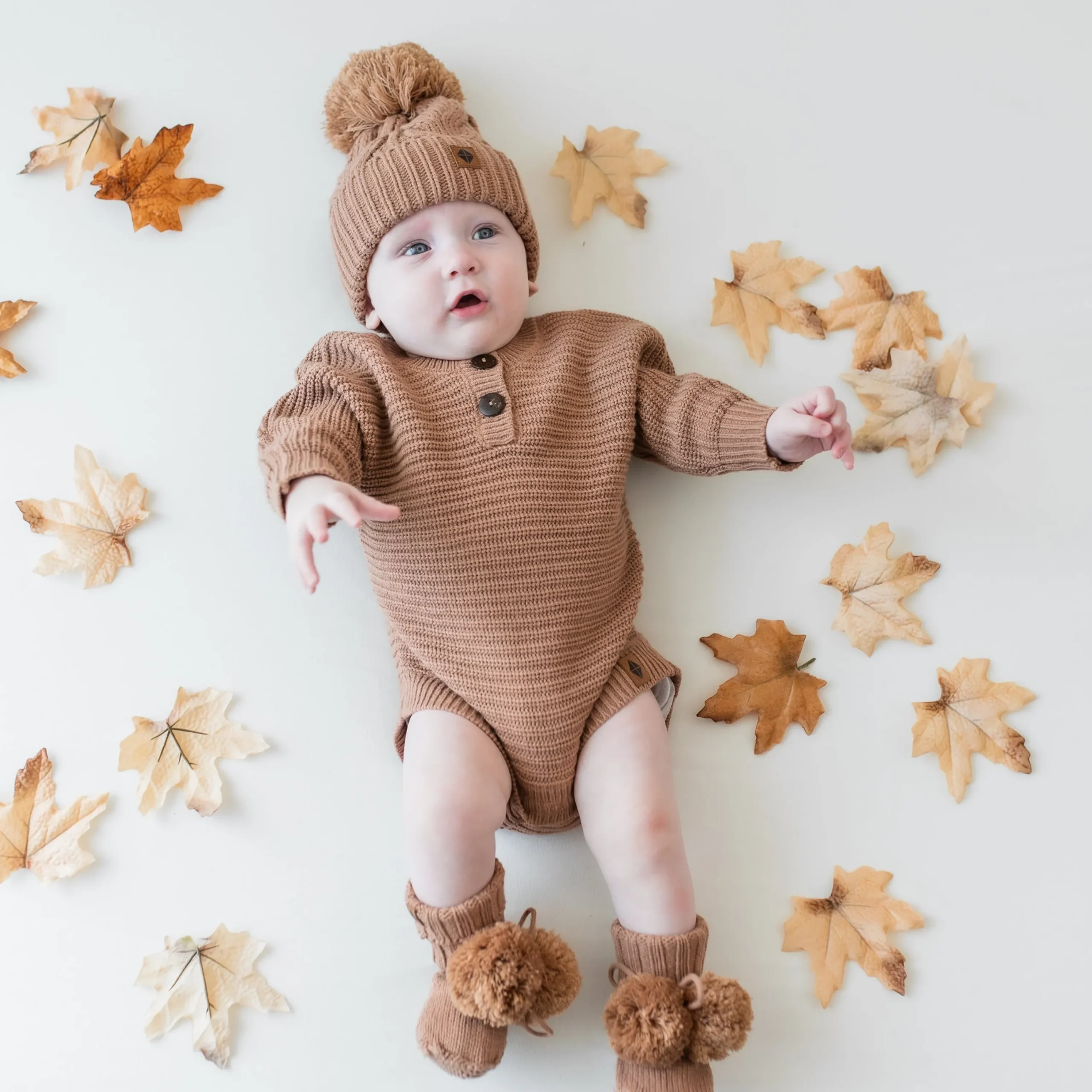 Kyte Baby Chunky Knit Romper in Latte New