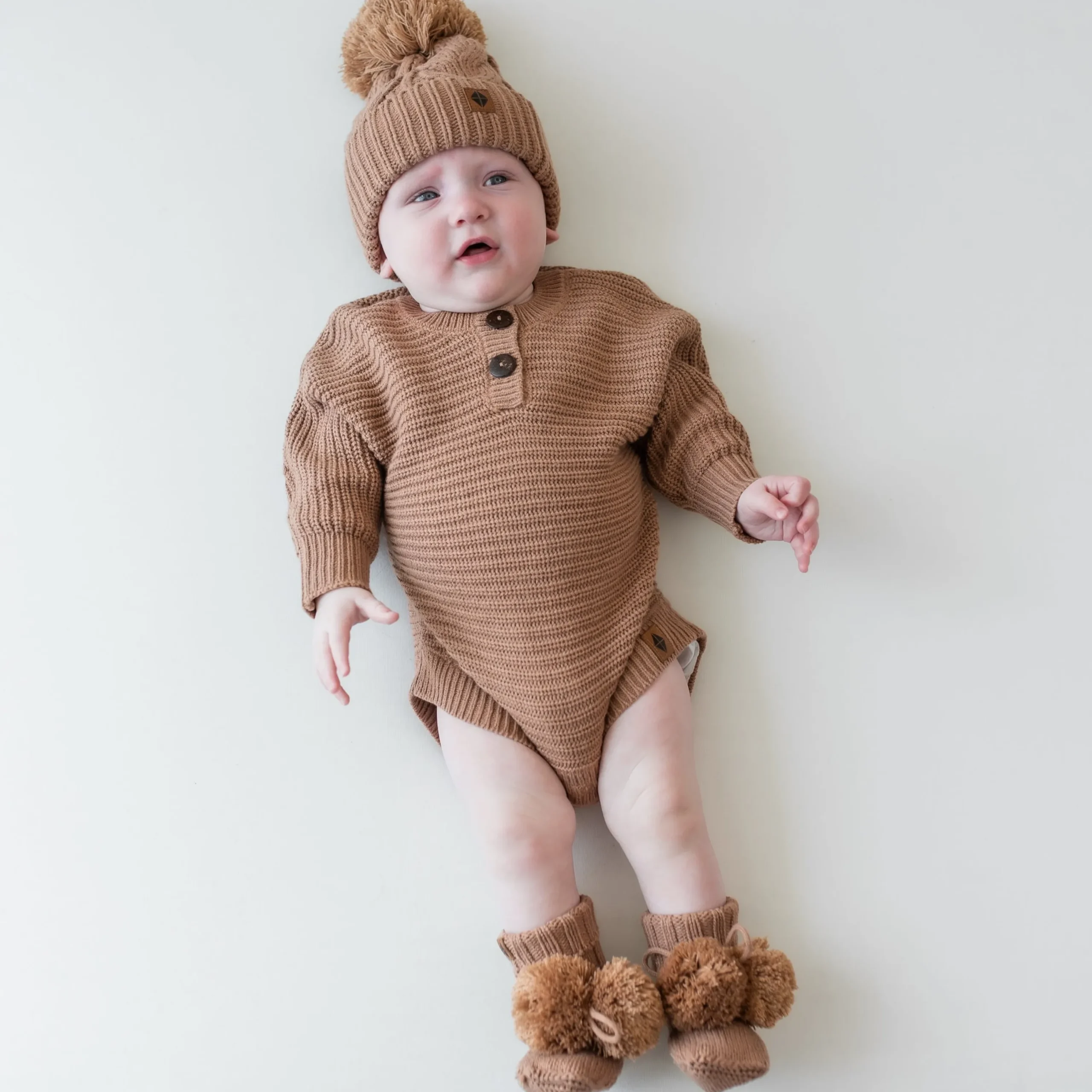 Kyte Baby Chunky Knit Romper in Latte New