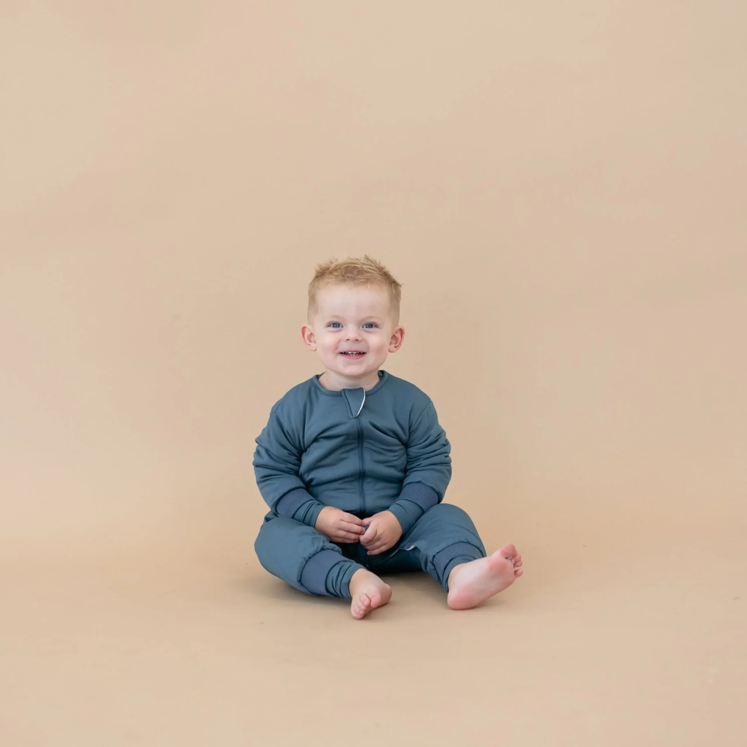 Kyte Baby Cozy Playsuit in Atlantic Online