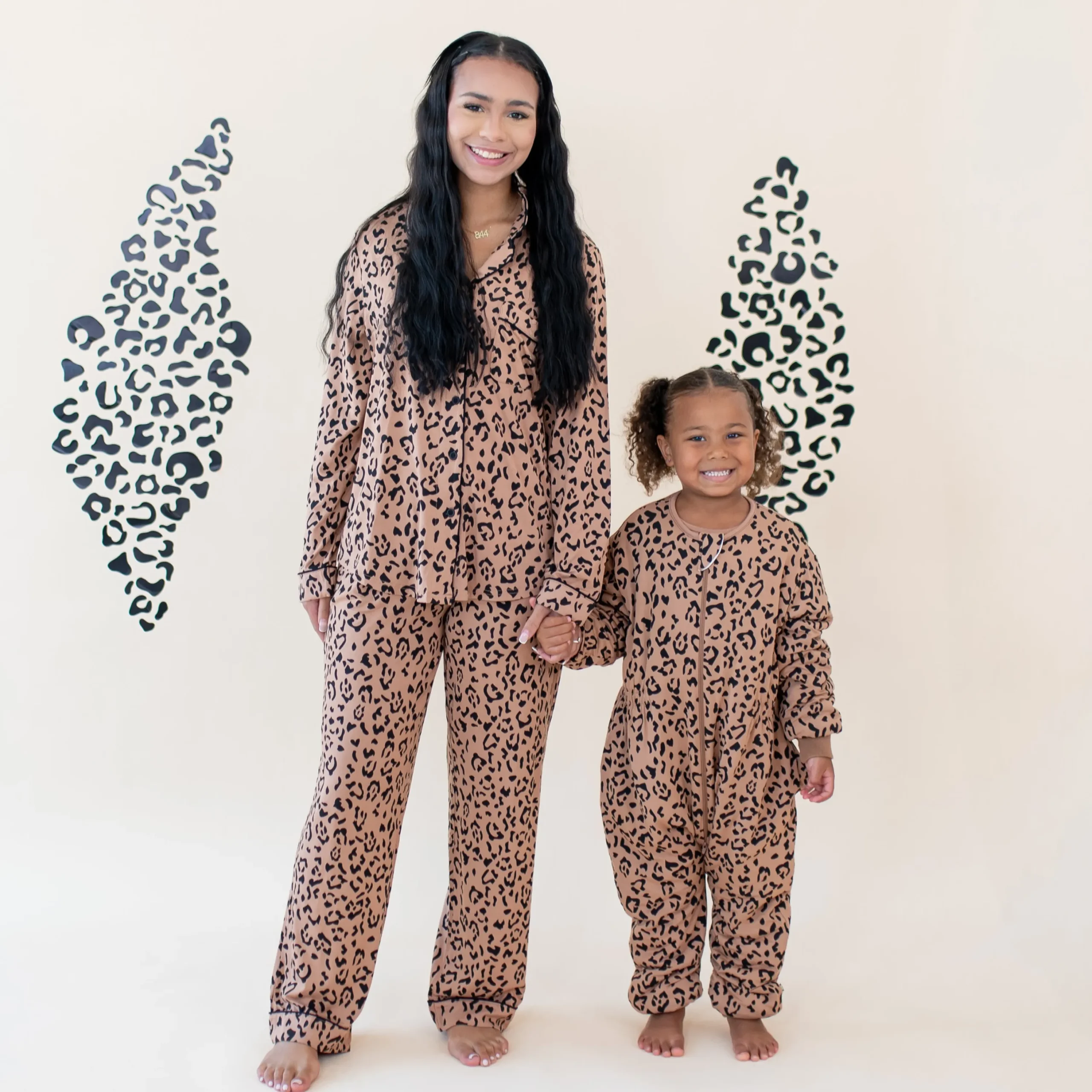 Kyte Baby Cozy Playsuit in Latte Leopard Clearance