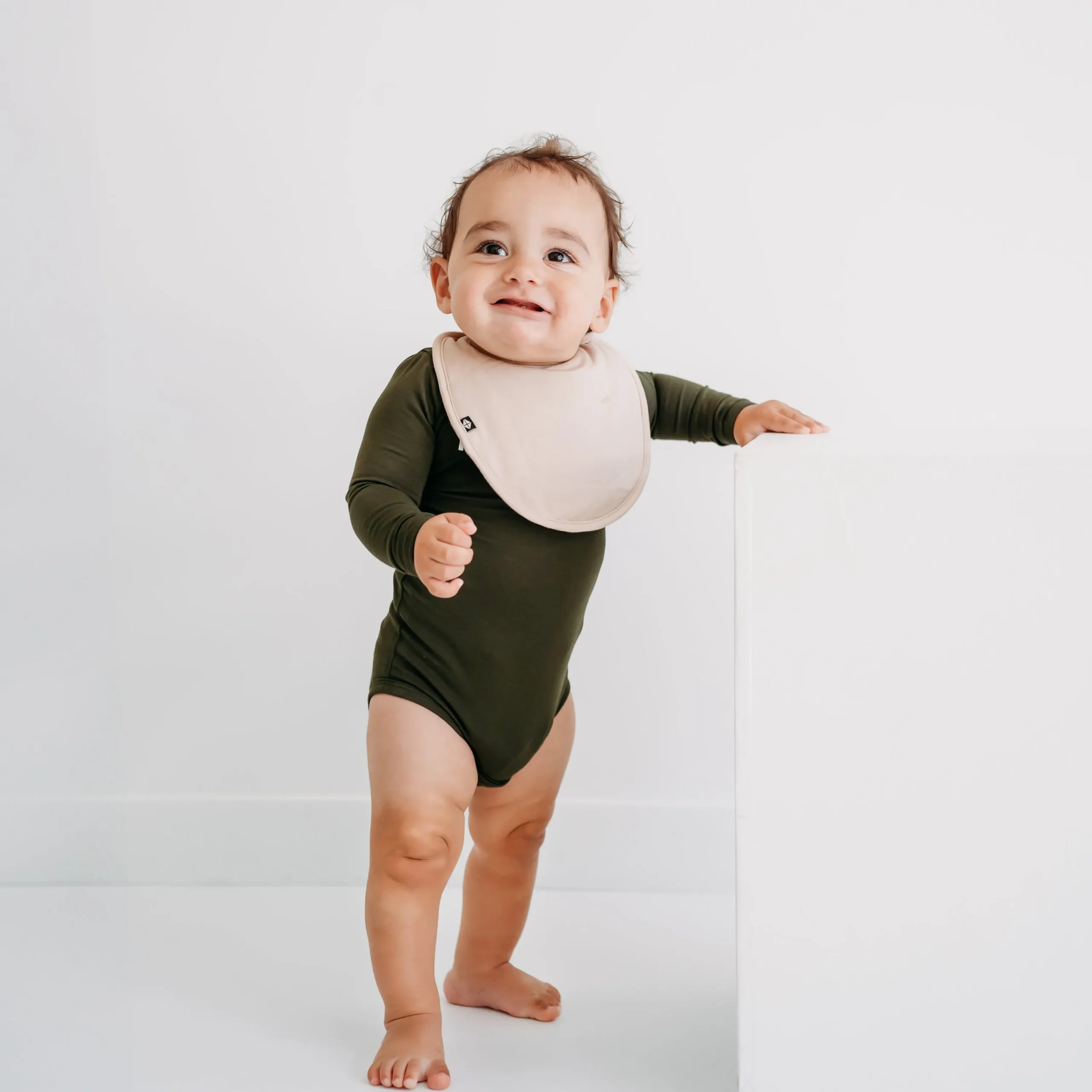 Kyte Baby Cushy Bib in Bisque Online