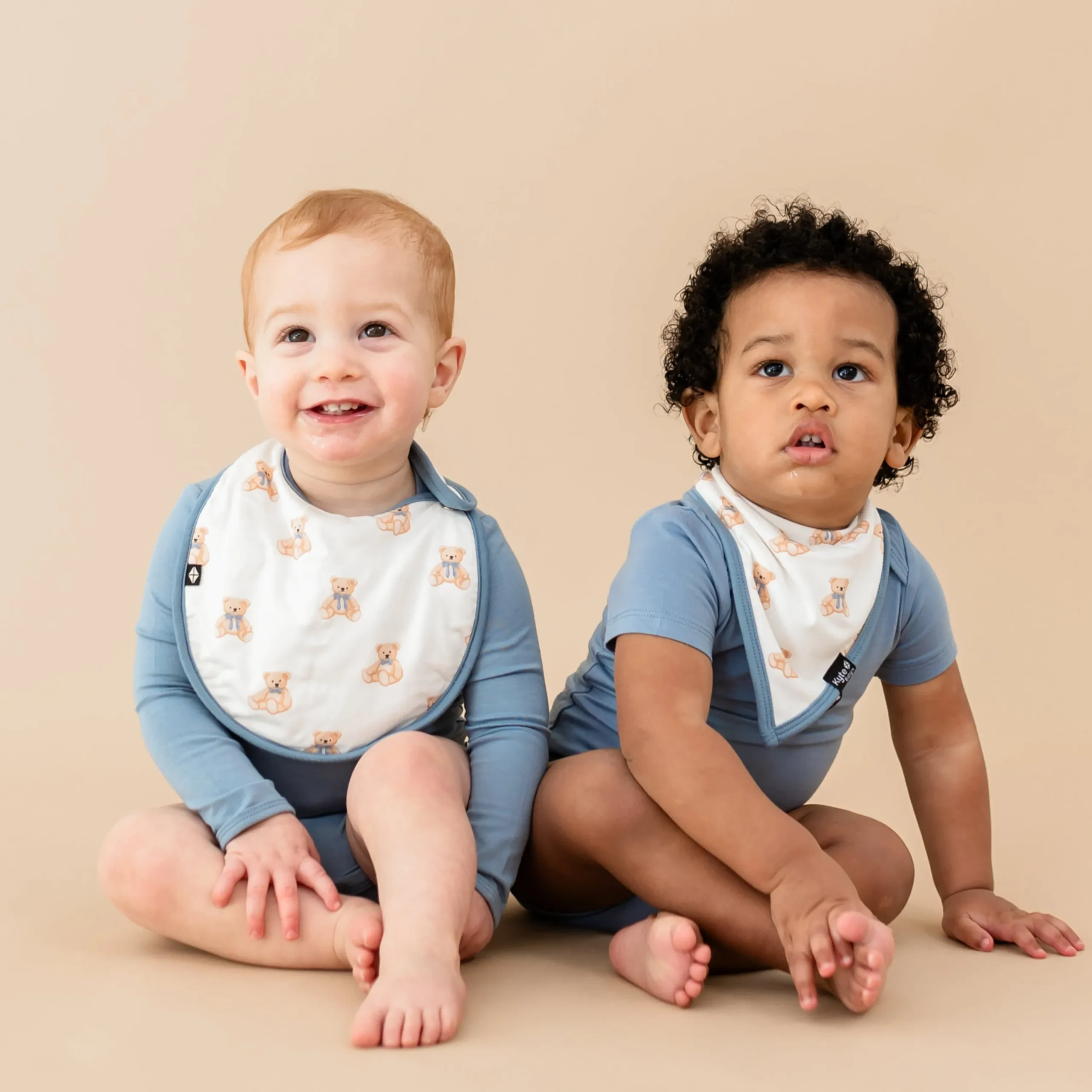 Kyte Baby Cushy Bib in Teddy Bear Hot