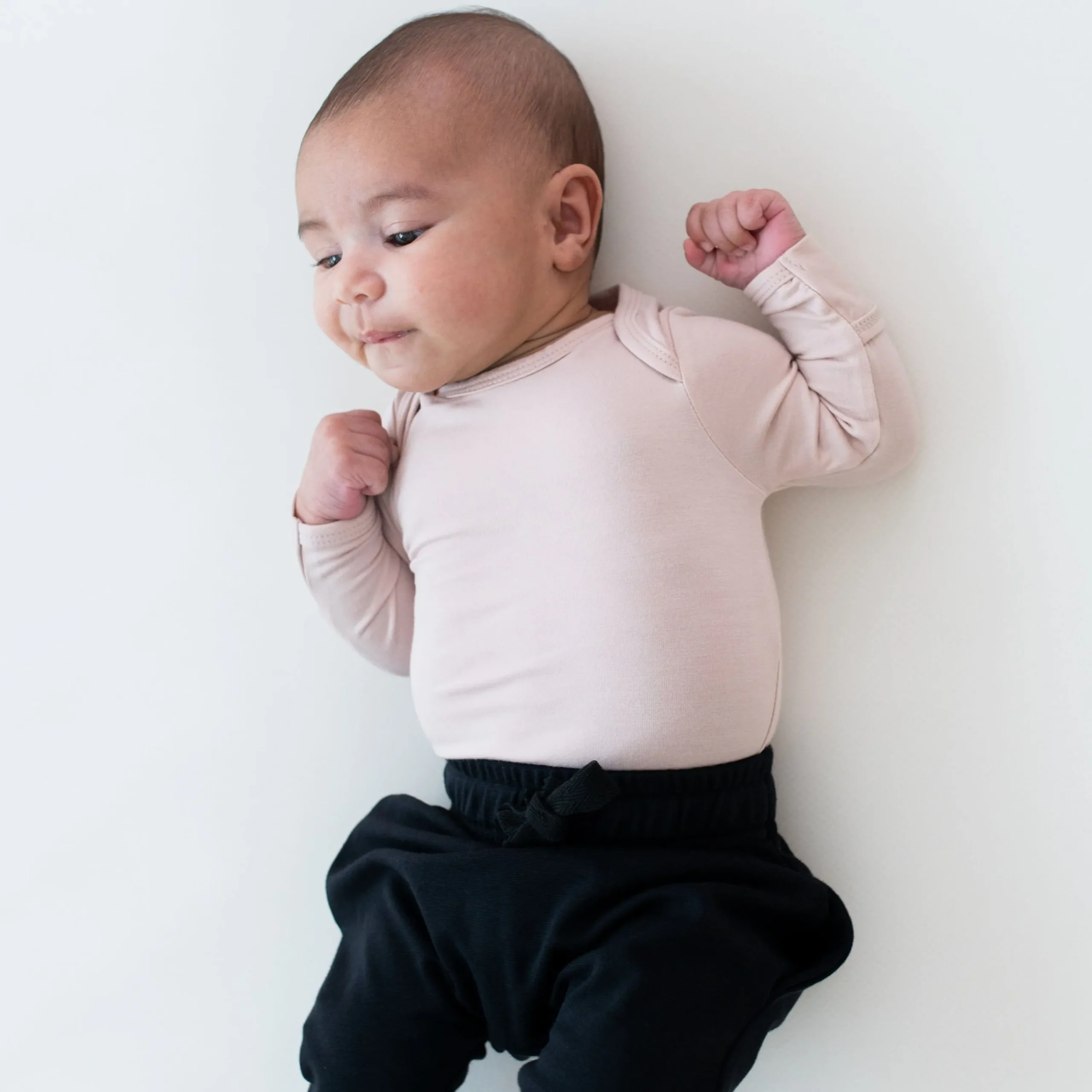 Kyte Baby Long Sleeve Bodysuit in Blush Clearance