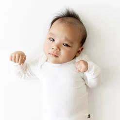 Kyte Baby Long Sleeve Bodysuit in Cloud Hot