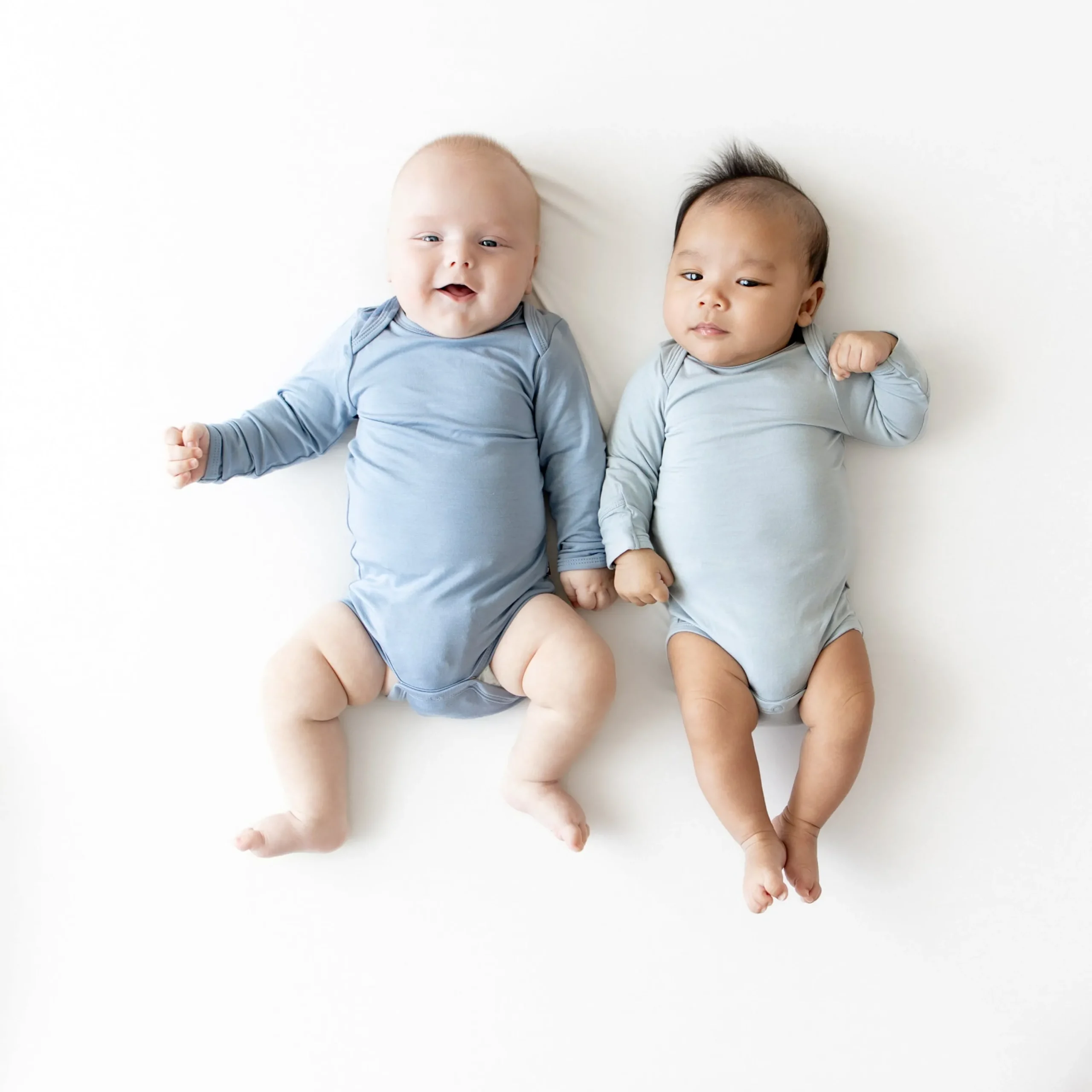 Kyte Baby Long Sleeve Bodysuit in Fog Clearance