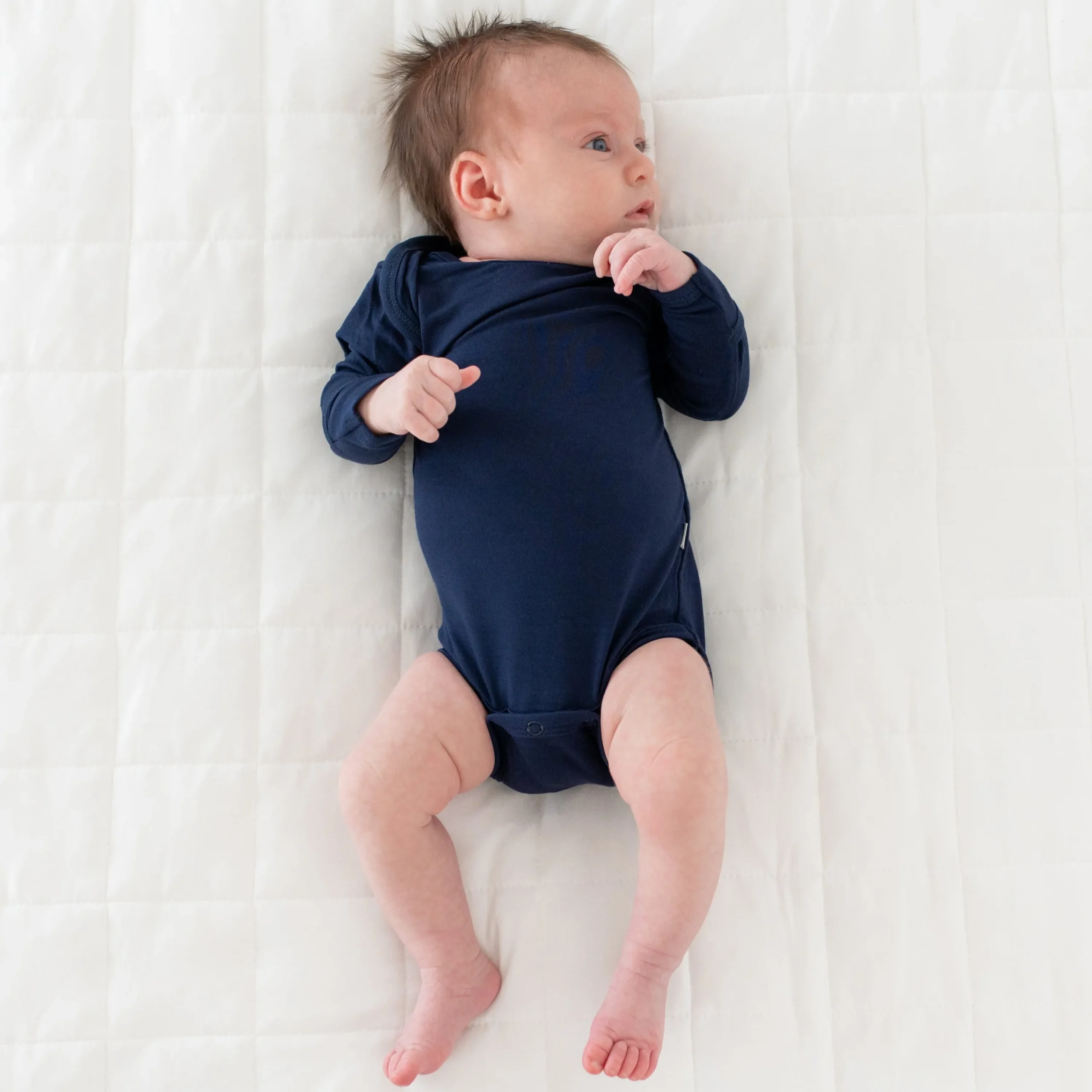 Kyte Baby Long Sleeve Bodysuit in Navy Sale