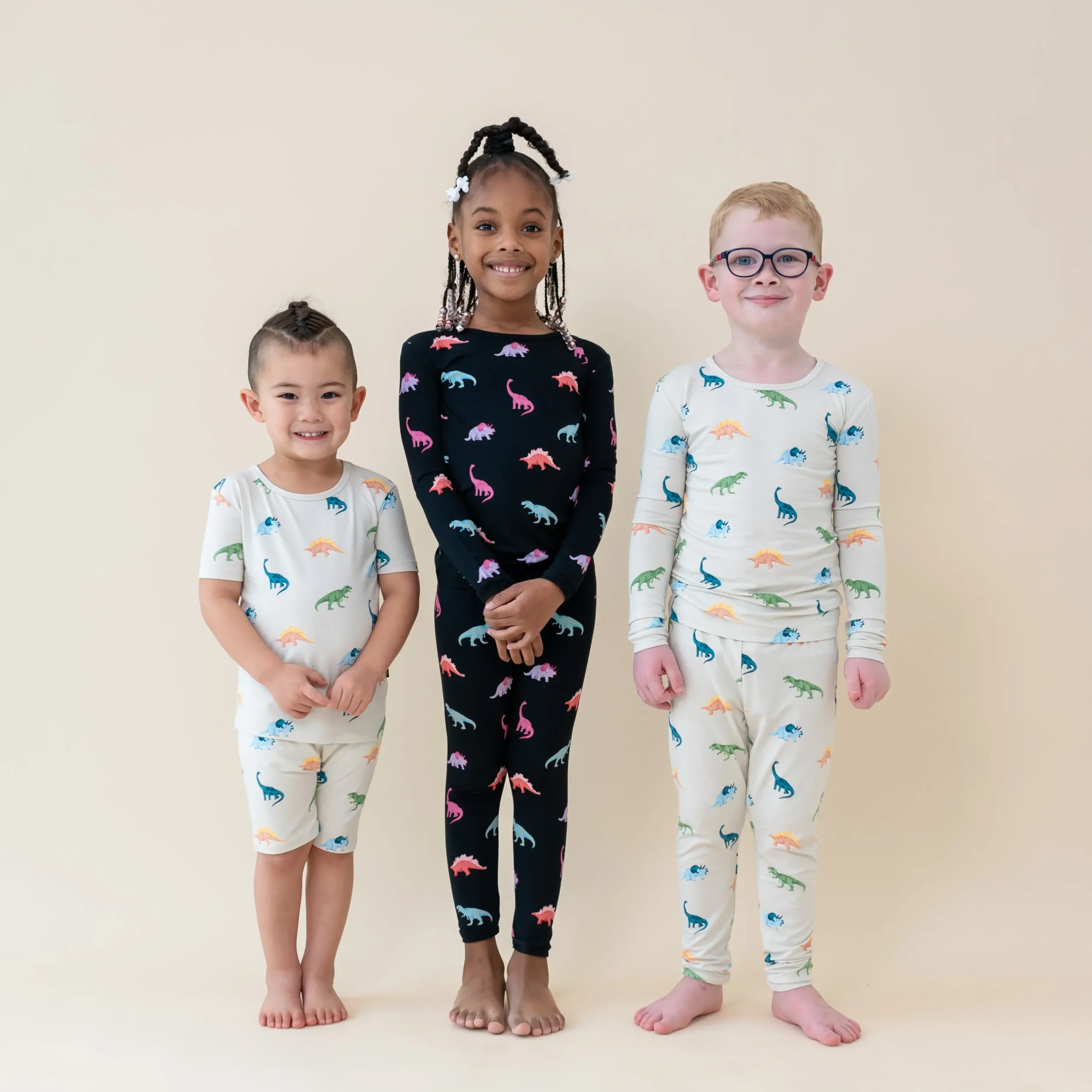 Kyte Baby Long Sleeve Pajamas in Ecru Roar Hot