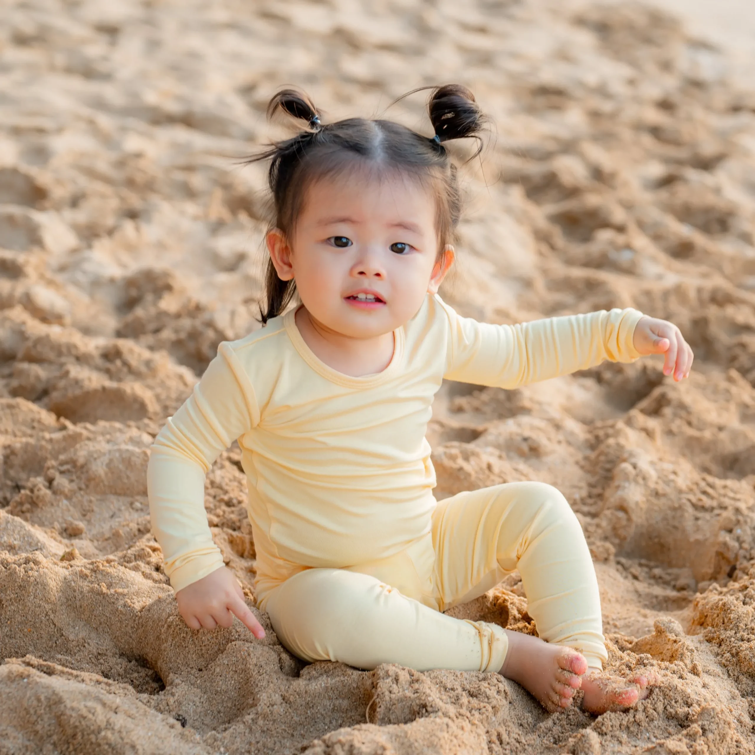 Kyte Baby Long Sleeve Pajamas in Lilikoi Clearance