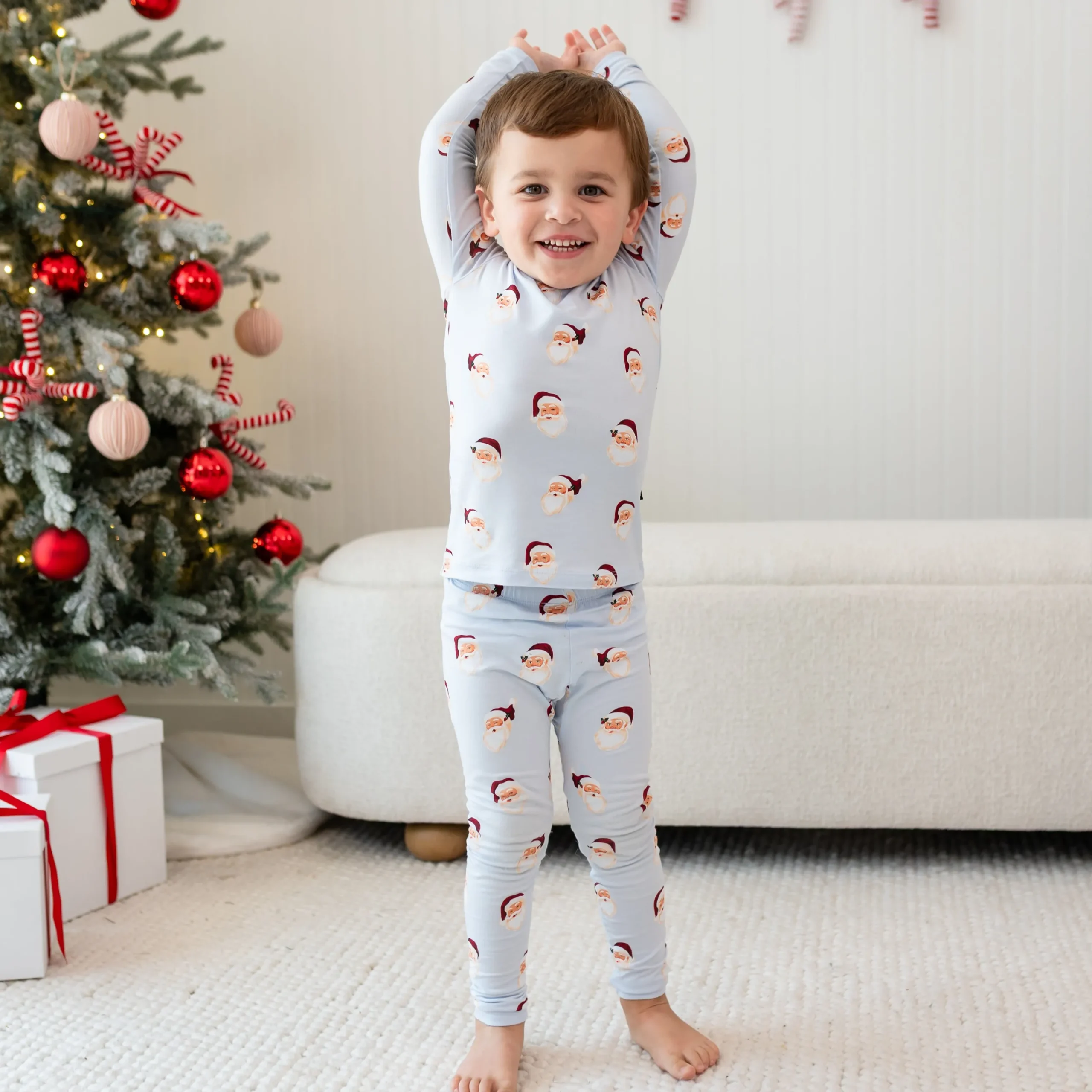Kyte Baby Long Sleeve Pajamas in Vintage Santa Best