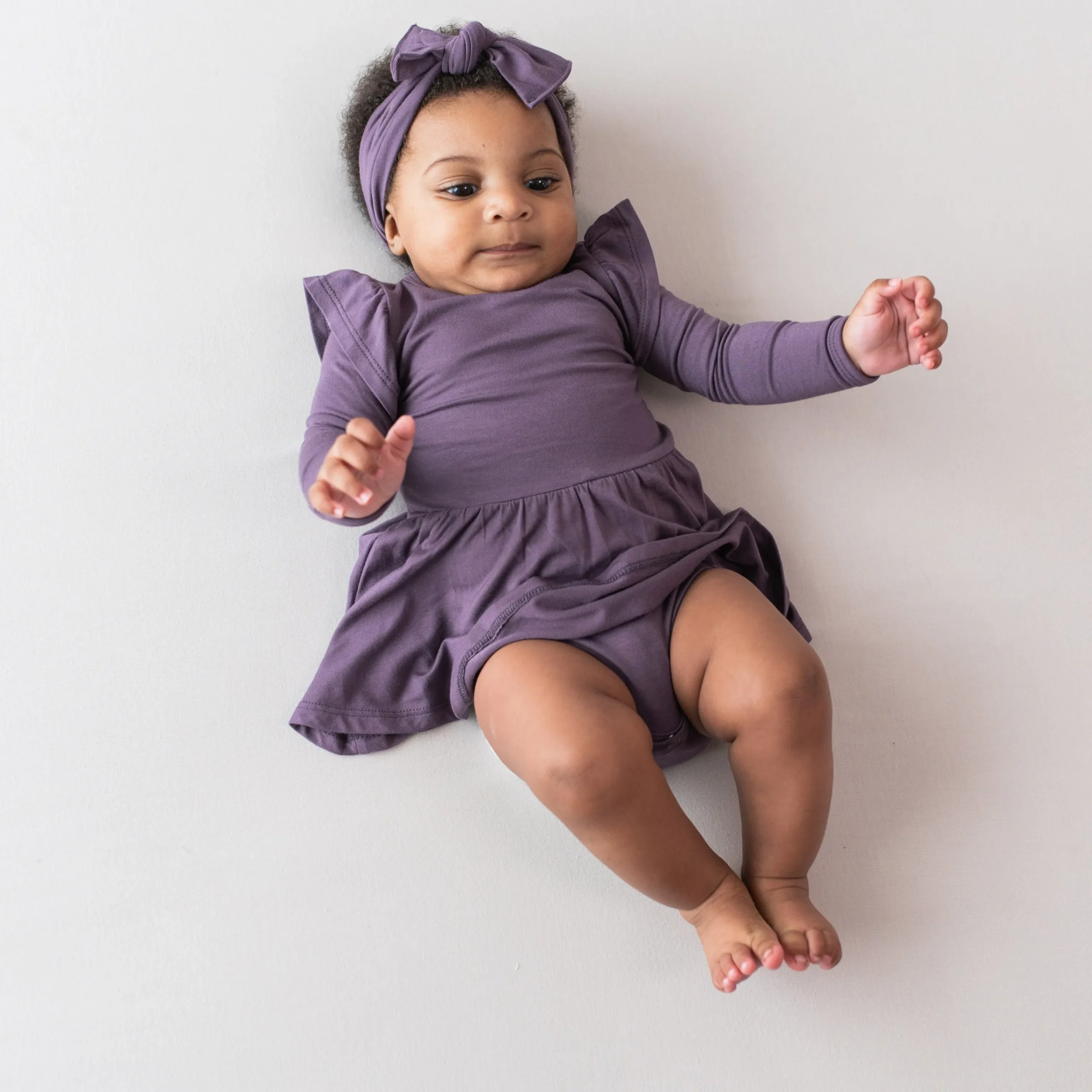 Kyte Baby Long Sleeve Twirl Bodysuit Dress in Currant Best