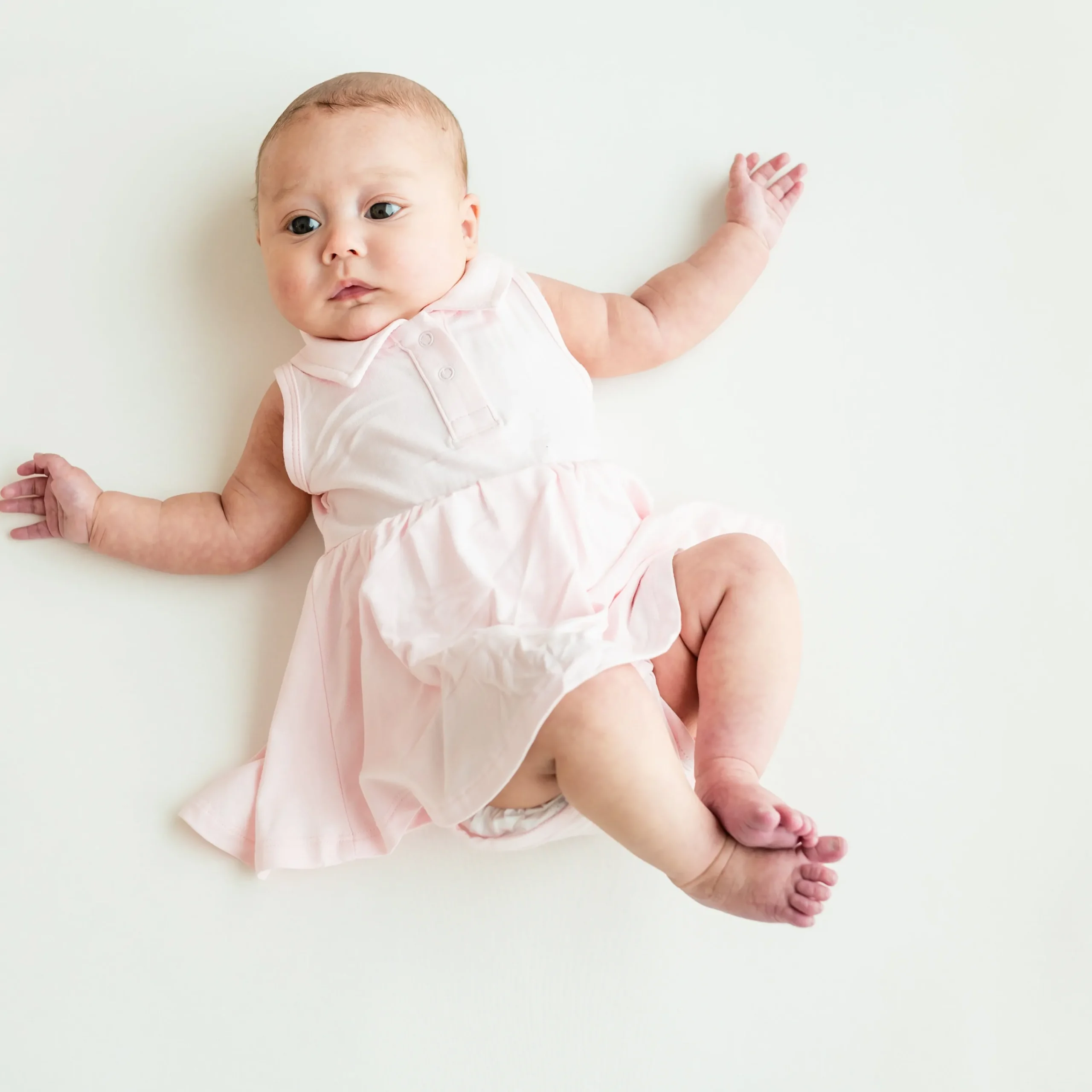 Kyte Baby Polo Bodysuit Dress in Sakura Discount