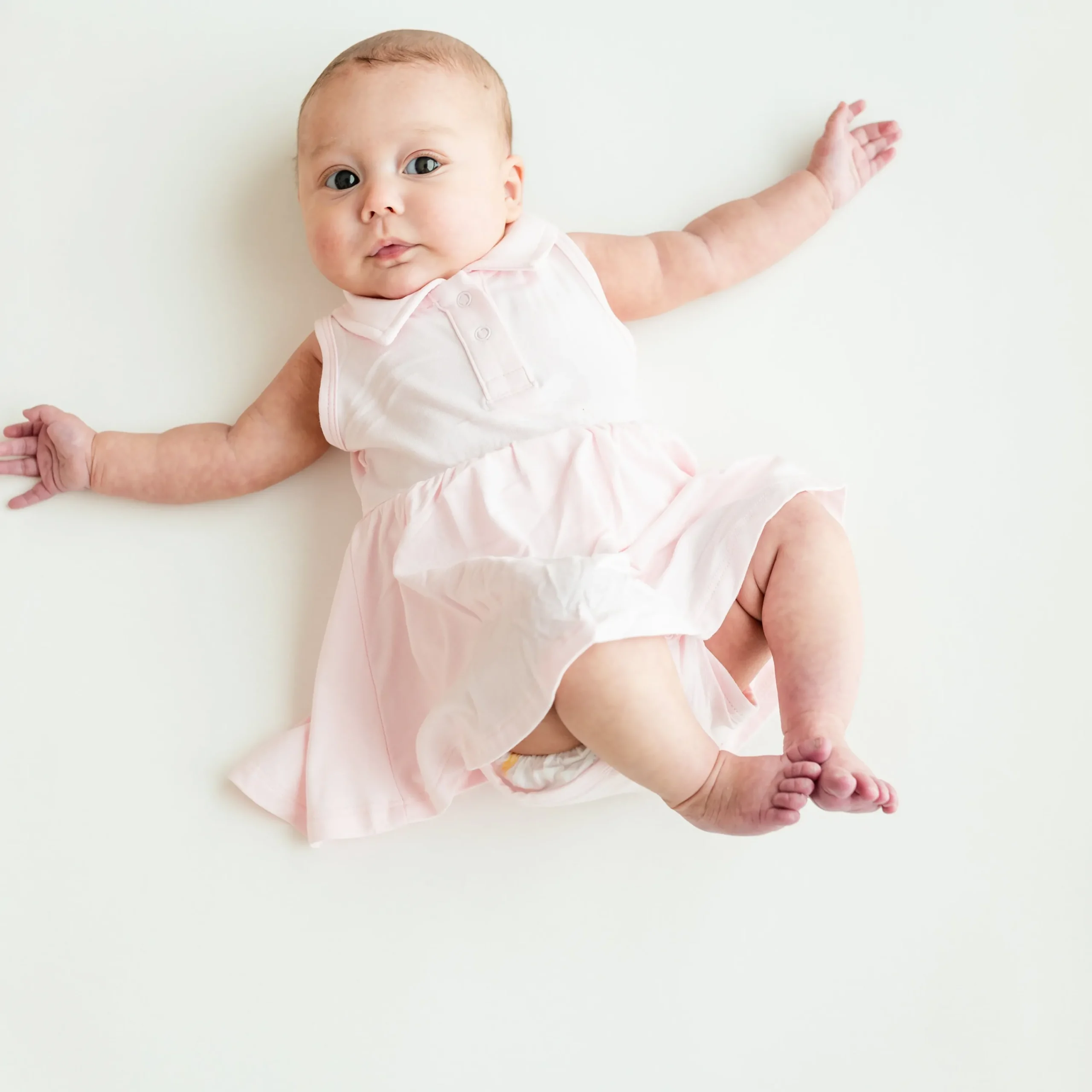 Kyte Baby Polo Bodysuit Dress in Sakura Discount