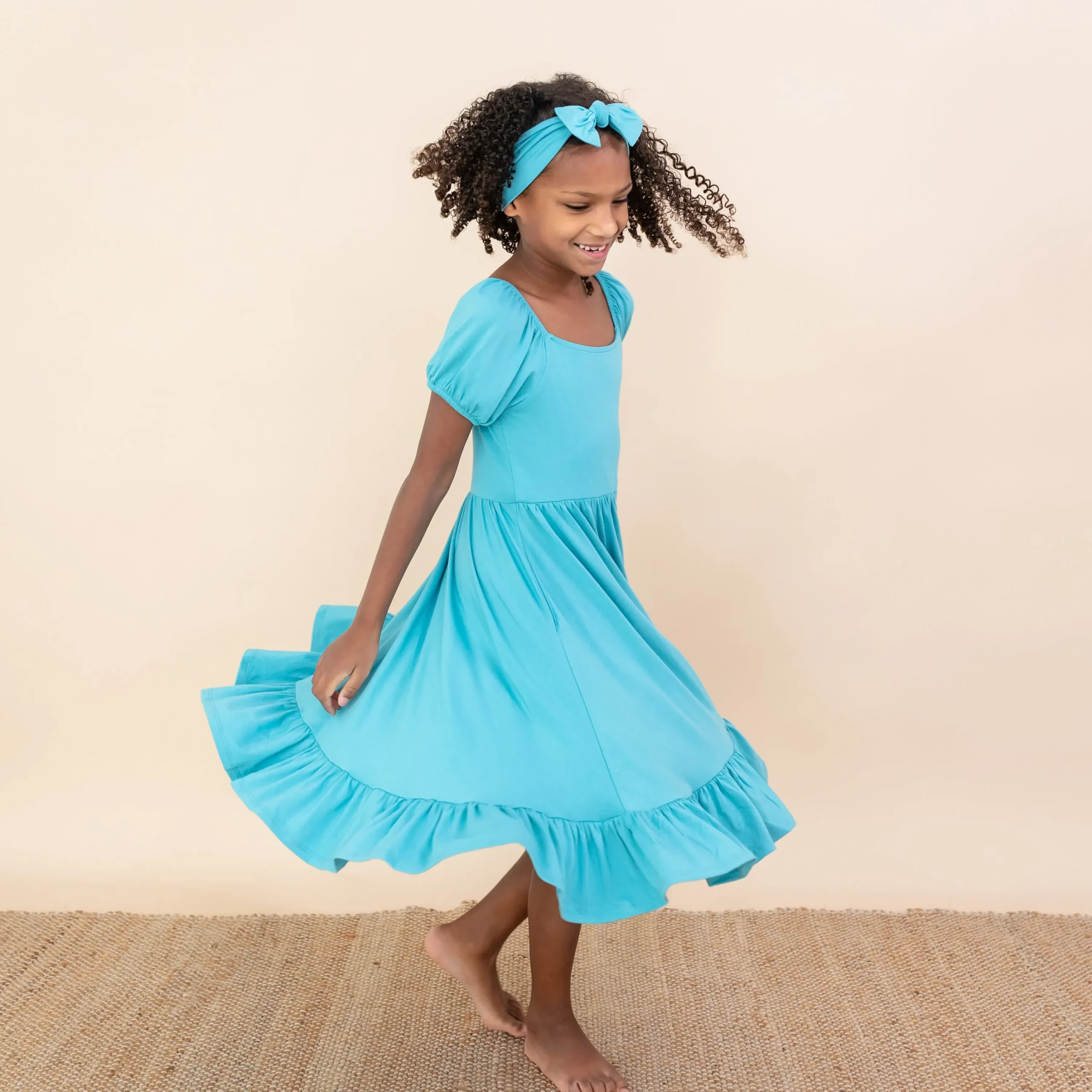 Kyte Baby Puff Sleeve Twirl Dress in Makai Best