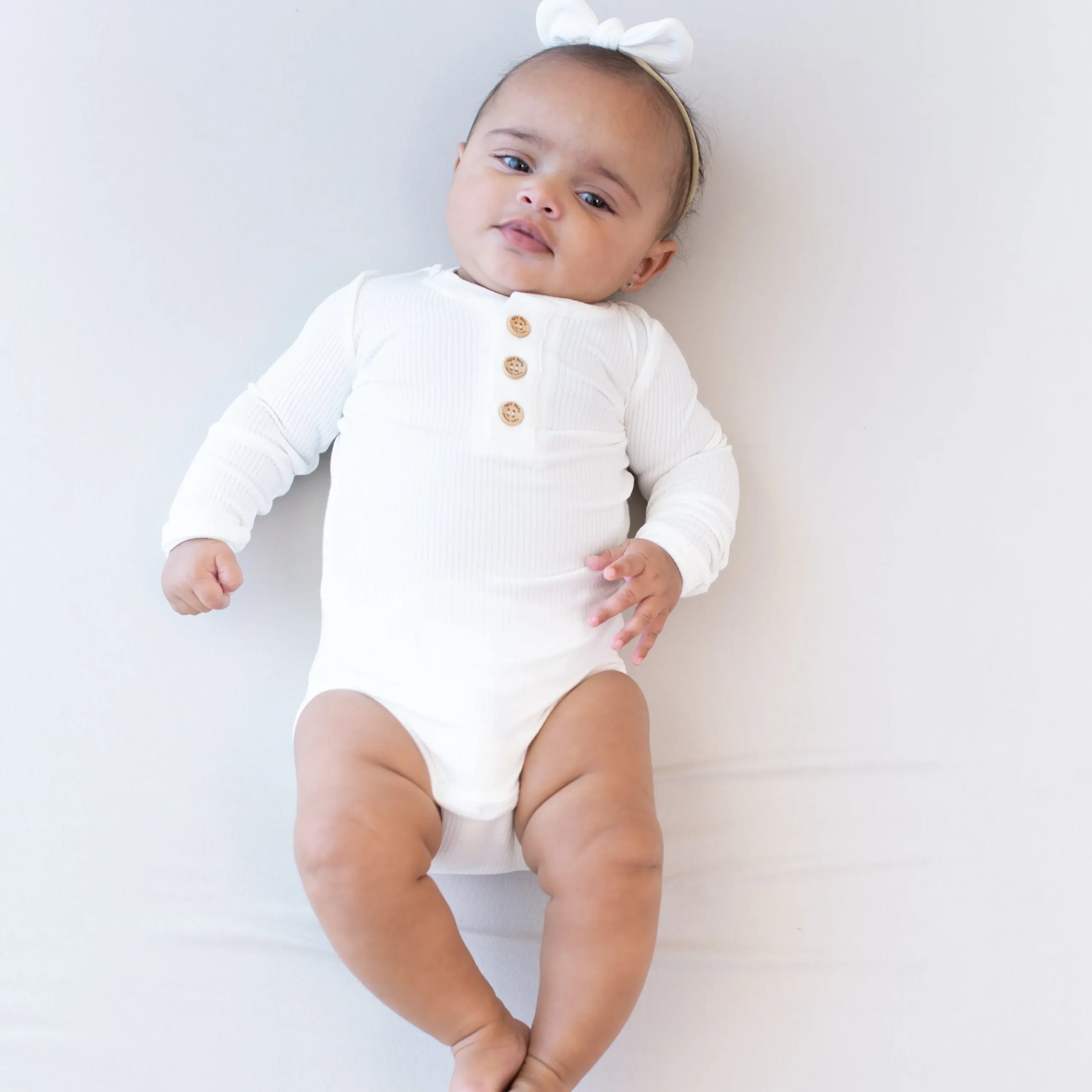 Kyte Baby Ribbed Long Sleeve Henley Bodysuit in Cloud Sale