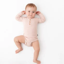 Kyte Baby Ribbed Long Sleeve Henley Bodysuit in Blush Clearance