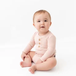 Kyte Baby Ribbed Long Sleeve Henley Bodysuit in Blush Clearance