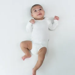 Kyte Baby Ribbed Long Sleeve Ruffle Leotard in Cloud