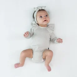 Kyte Baby Ribbed Long Sleeve Ruffle Leotard in Oat