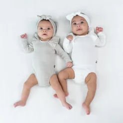 Kyte Baby Ribbed Long Sleeve Ruffle Leotard in Oat