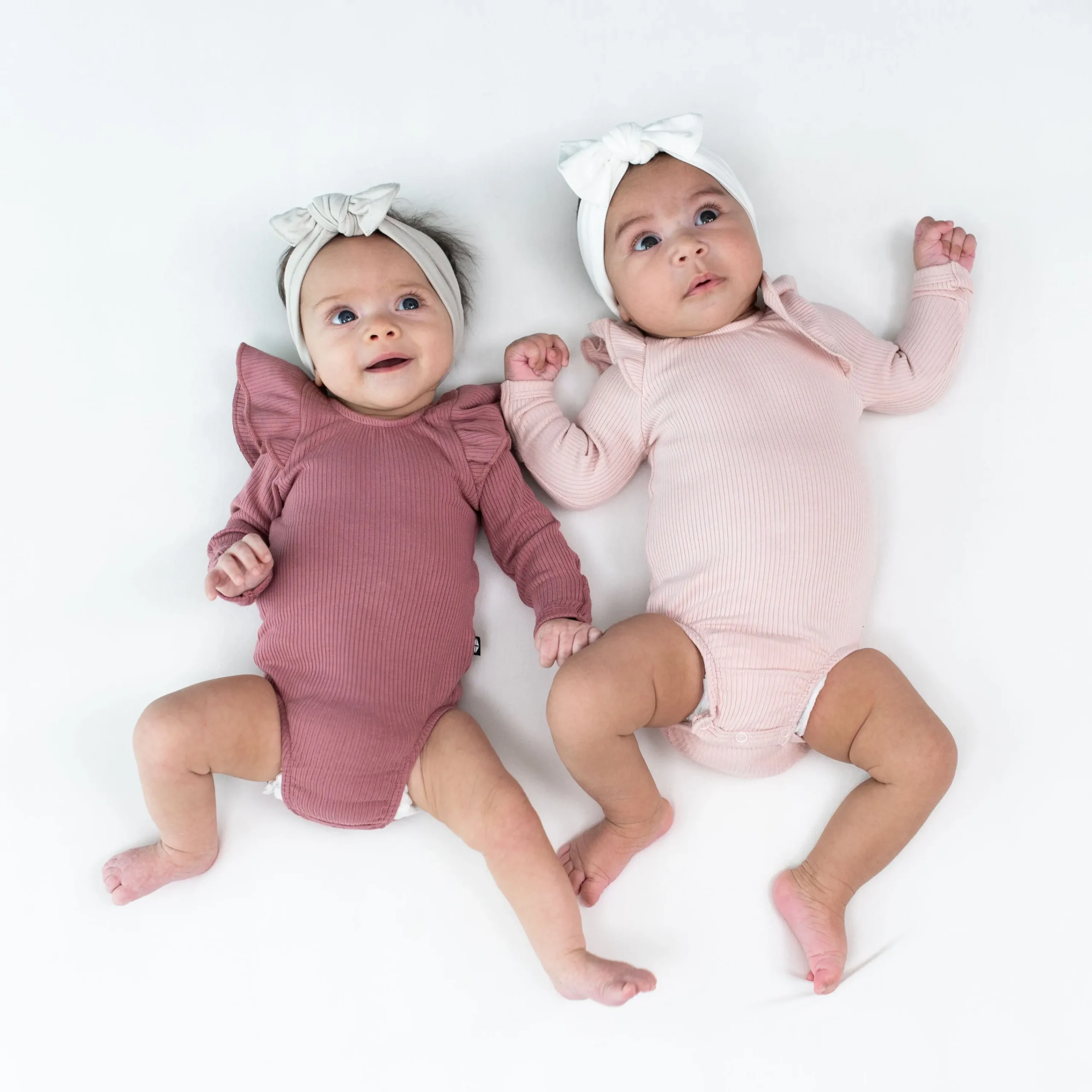 Kyte Baby Ribbed Long Sleeve Ruffle Leotard in Blush Discount