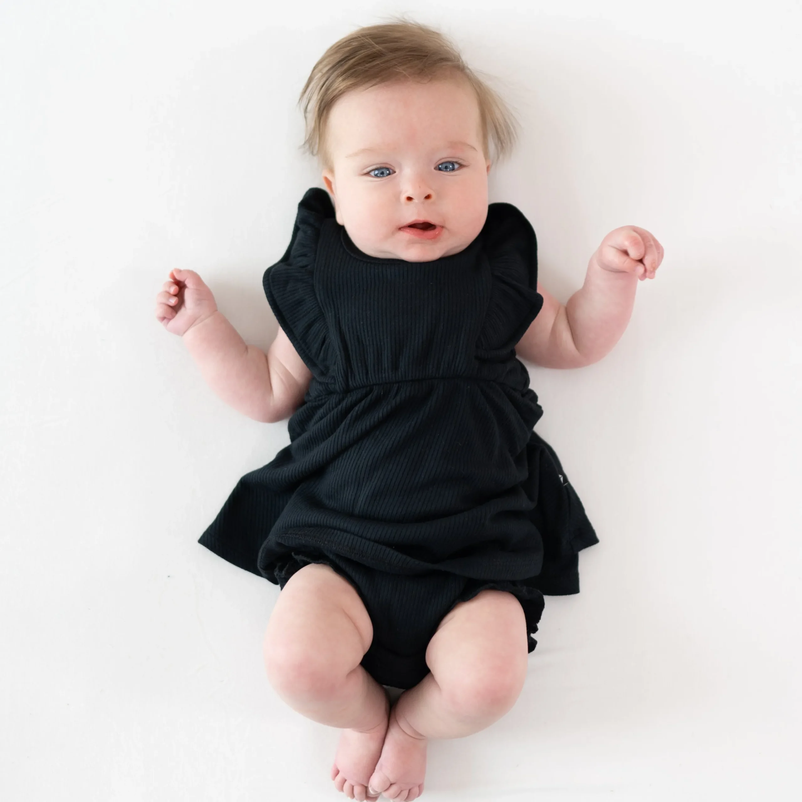 Kyte Baby Ribbed Peplum Dress Set in Midnight Hot
