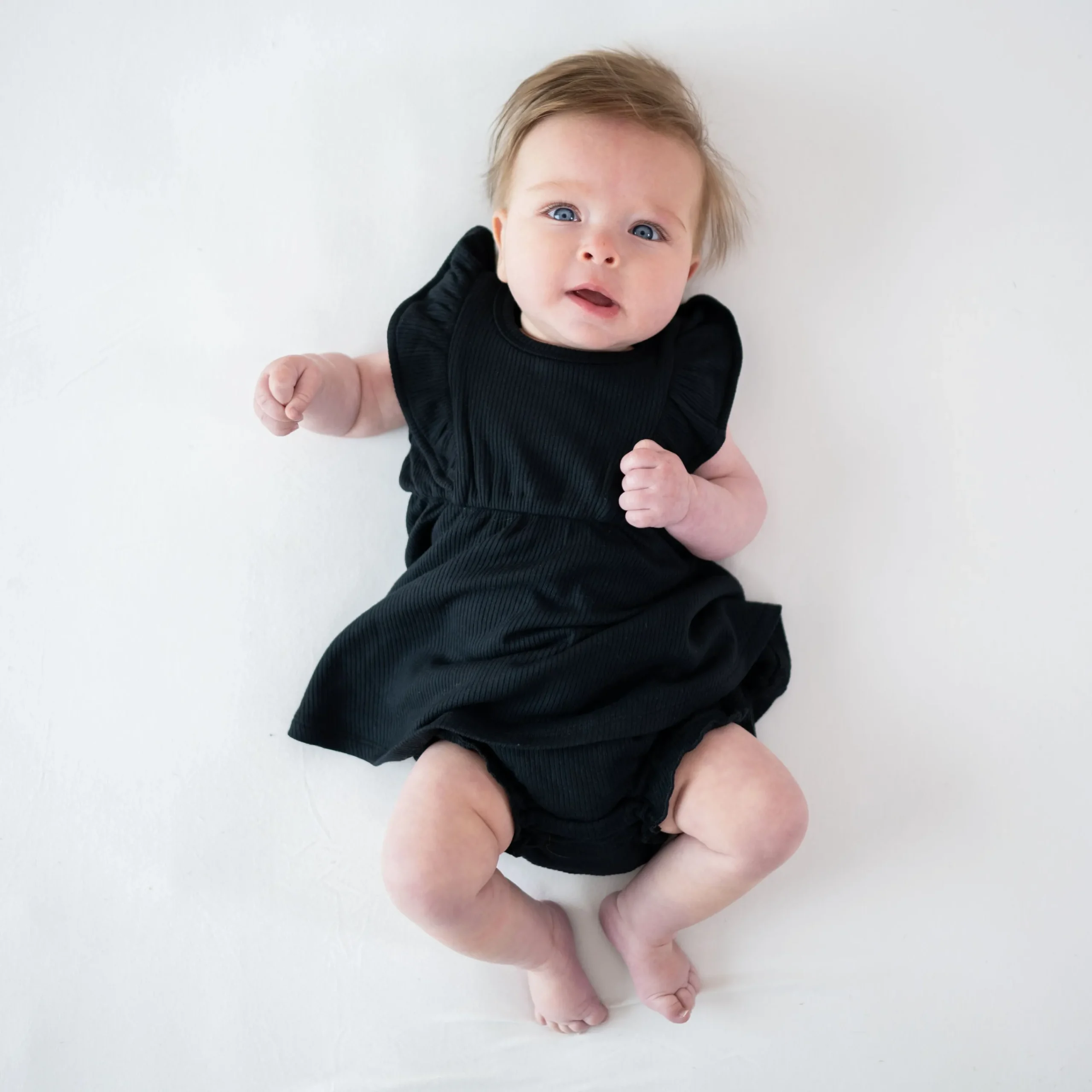 Kyte Baby Ribbed Peplum Dress Set in Midnight Hot
