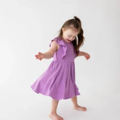 Kyte Baby Ribbed Peplum Dress Set in Poi