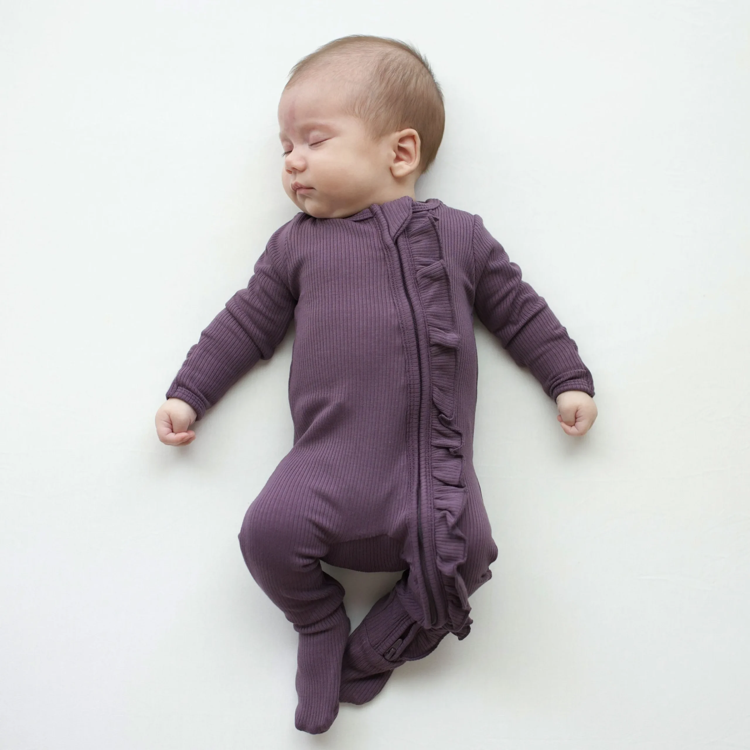 Kyte Baby Ribbed Ruffle Zipper Footie in Currant Online