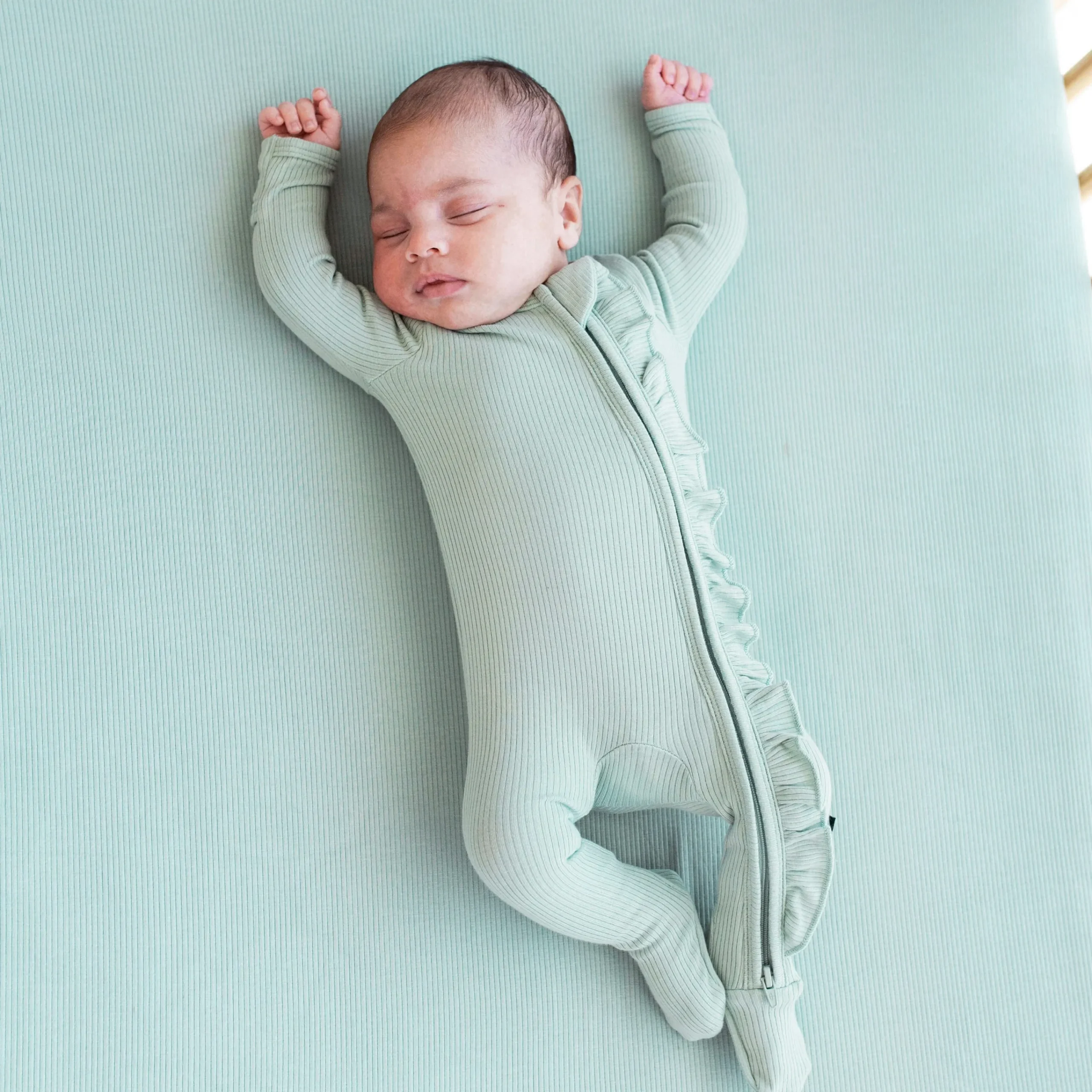 Kyte Baby Ribbed Ruffle Zipper Footie in Sage Clearance