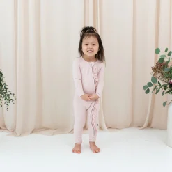 Kyte Baby Ribbed Ruffle Zipper Romper in Blush Hot